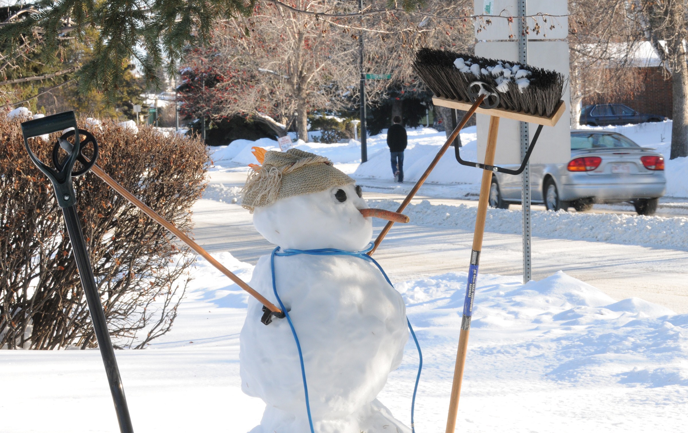 GETTING SUPPORT- A shovel and a broom support two ski poles that were used for a snowman’s arms in the Sunnybrook area of Red Deer