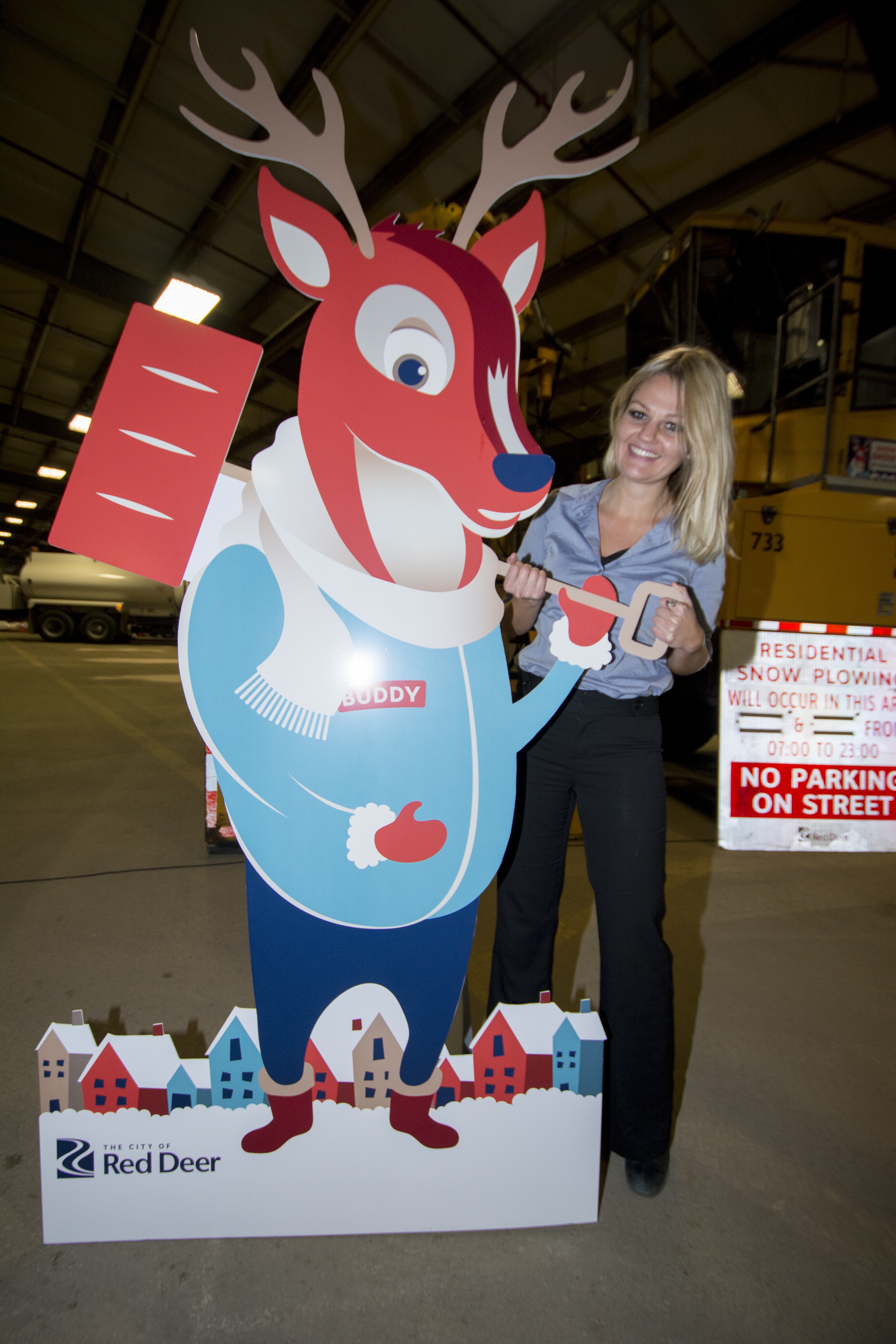 NEW PROGRAM – Mayor Tara Veer helps Red Deer’s new ‘Snow Buddy’ to shovel. Snow buddy encourages residents to help their friends