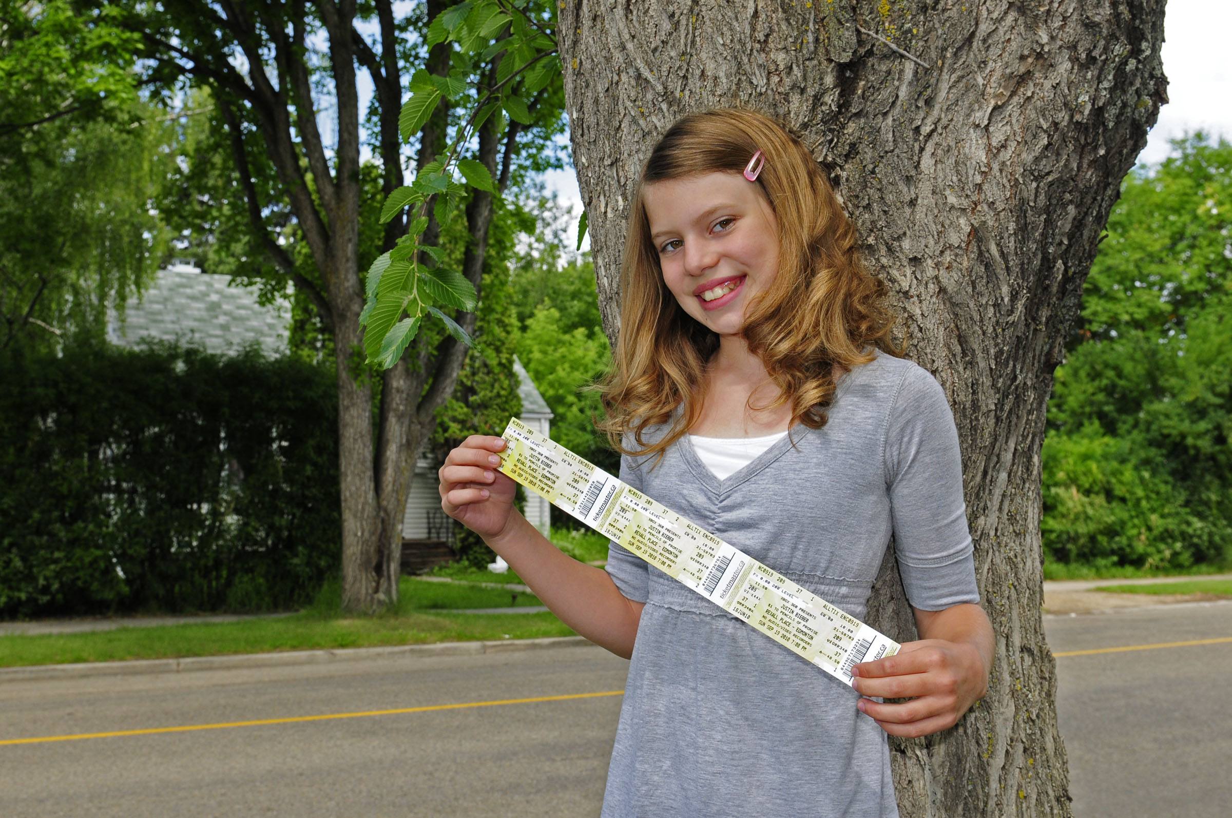 Natasha Walz of Red Deer donated her Justin Bieber concert tickets to the Learning Disabilities Association of Alberta for a fundraising raffle. The anonymous purchaser returned them to her so she can attend the concert after all.
