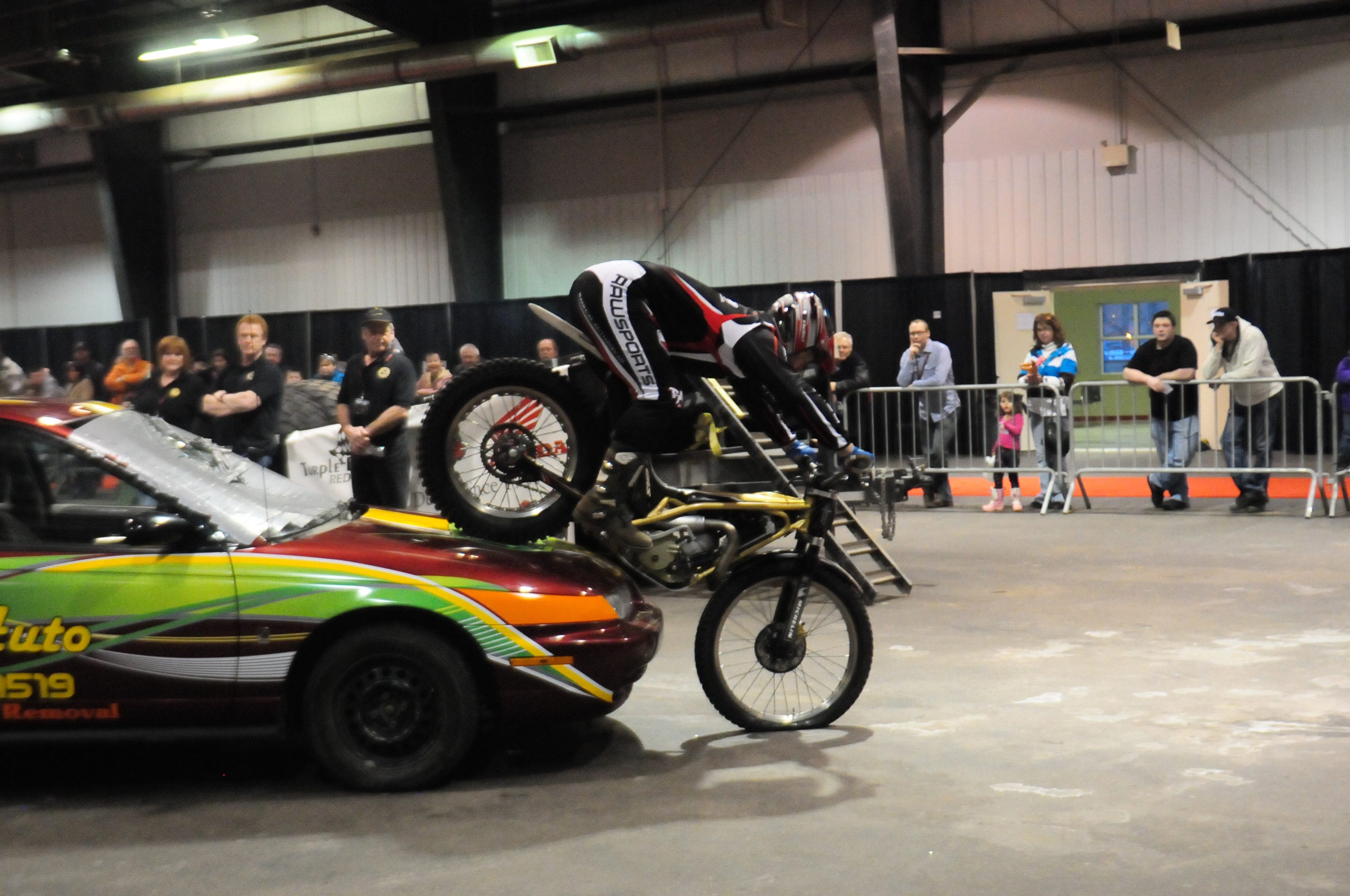 OVER OBSTACLES- Motorbike trials and tricks were just one of the attractions at the 2011 Motorcycle Show in Red Deer this past weekend along with choppers and other motorcycles