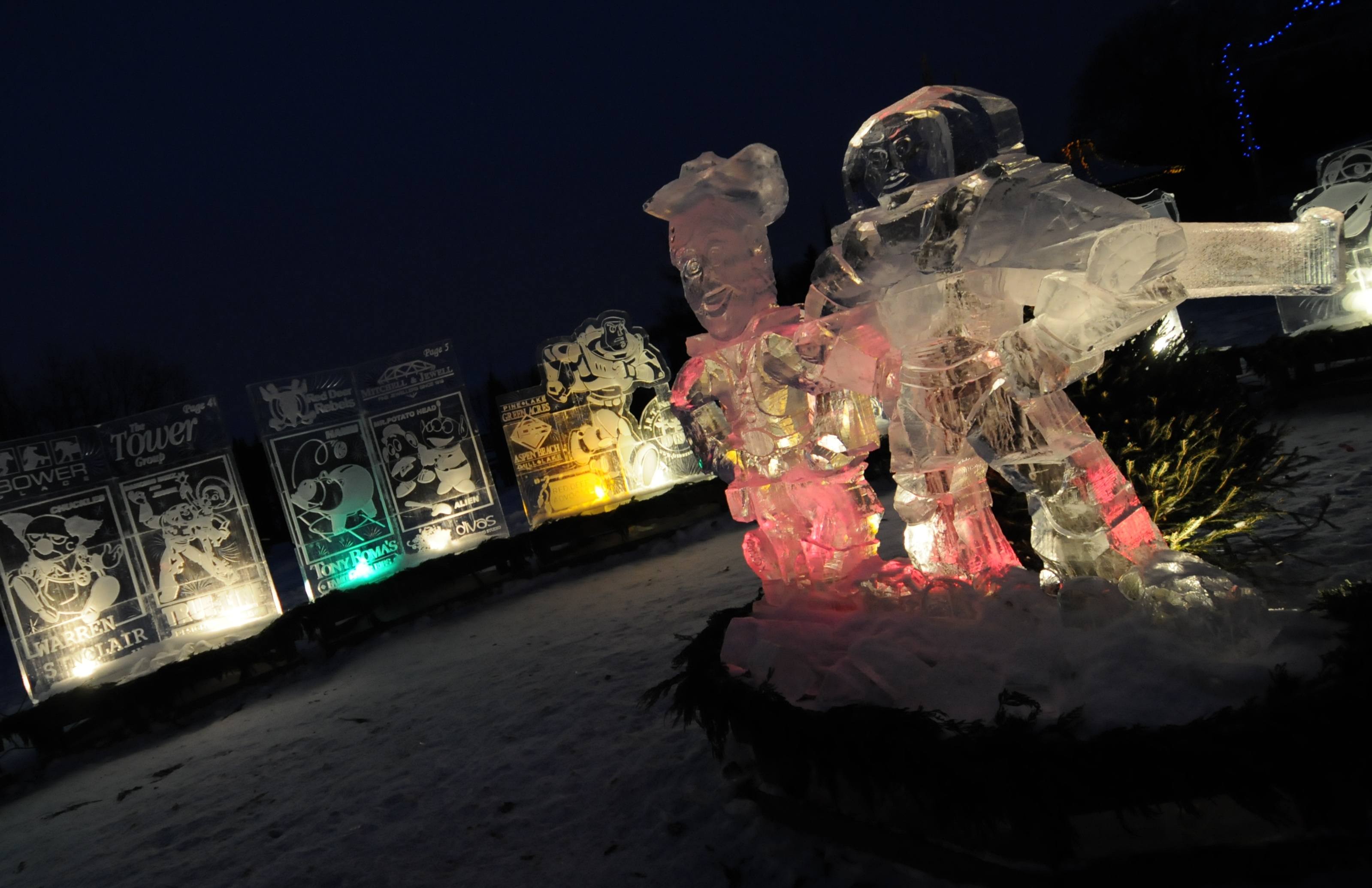 GLOWING- Ice sculptures in the theme of Toy Story shine in the dark at Parkland Nurseries and Garden Centre in Red Deer.