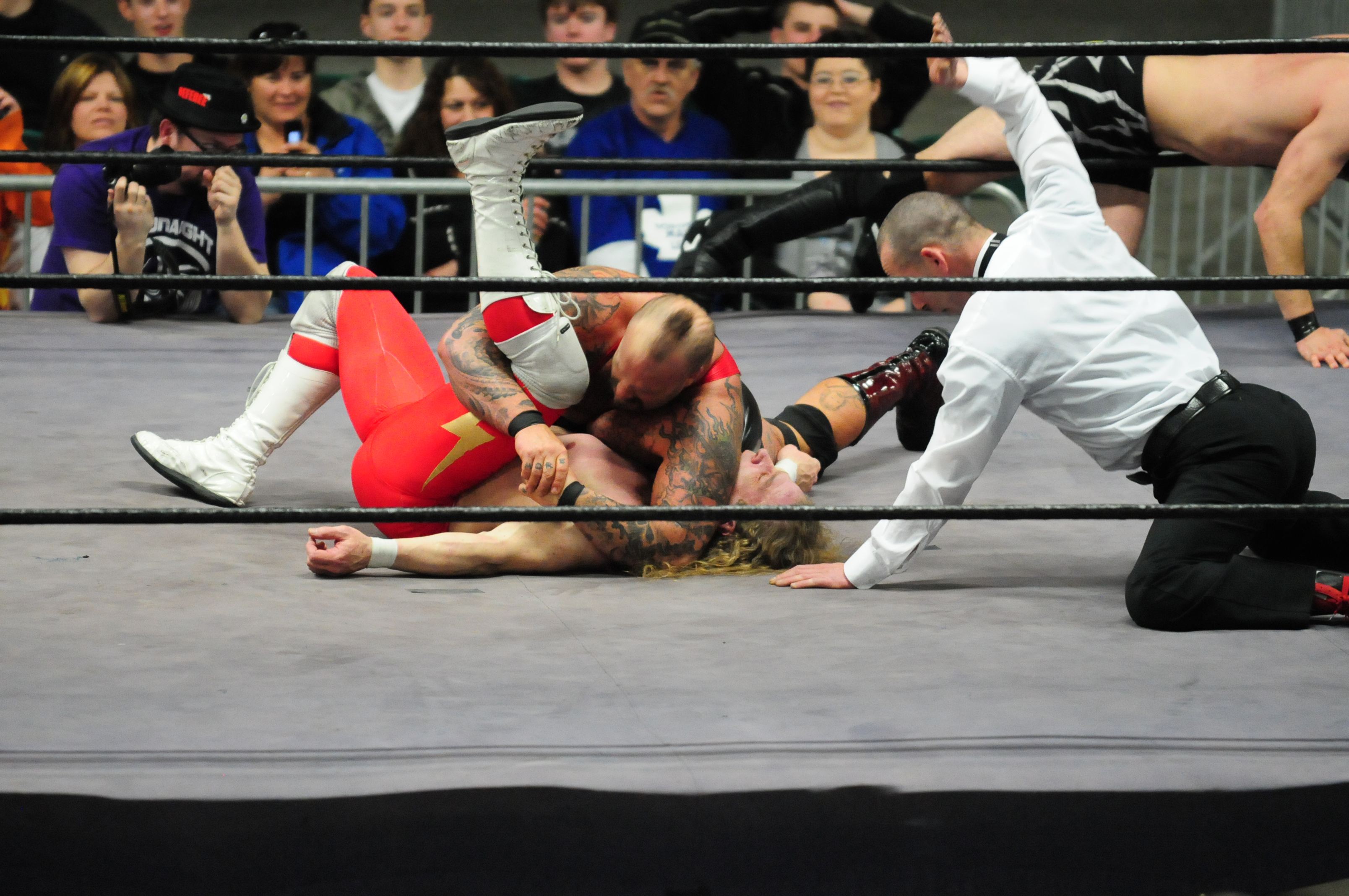 PINNED- Wrestler Massive Damage pins down Mark Posey during Live Pro Wrestling at the Westerner last Wednesday night. Other matches were Stormbringer vs. Vance Nevada of Red Deer