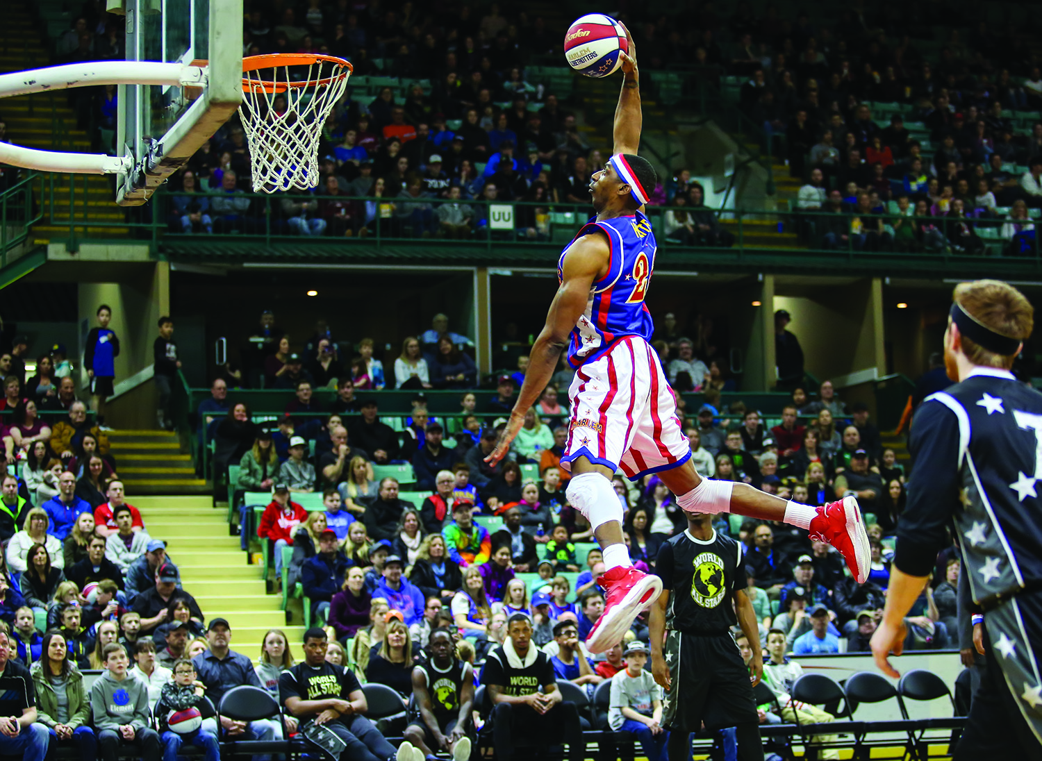 HIGH FLYING- The Harlem Globetrotters entertained fans with soaring basketball stunts and dance moves at the ENMAX Centrium on Friday night.