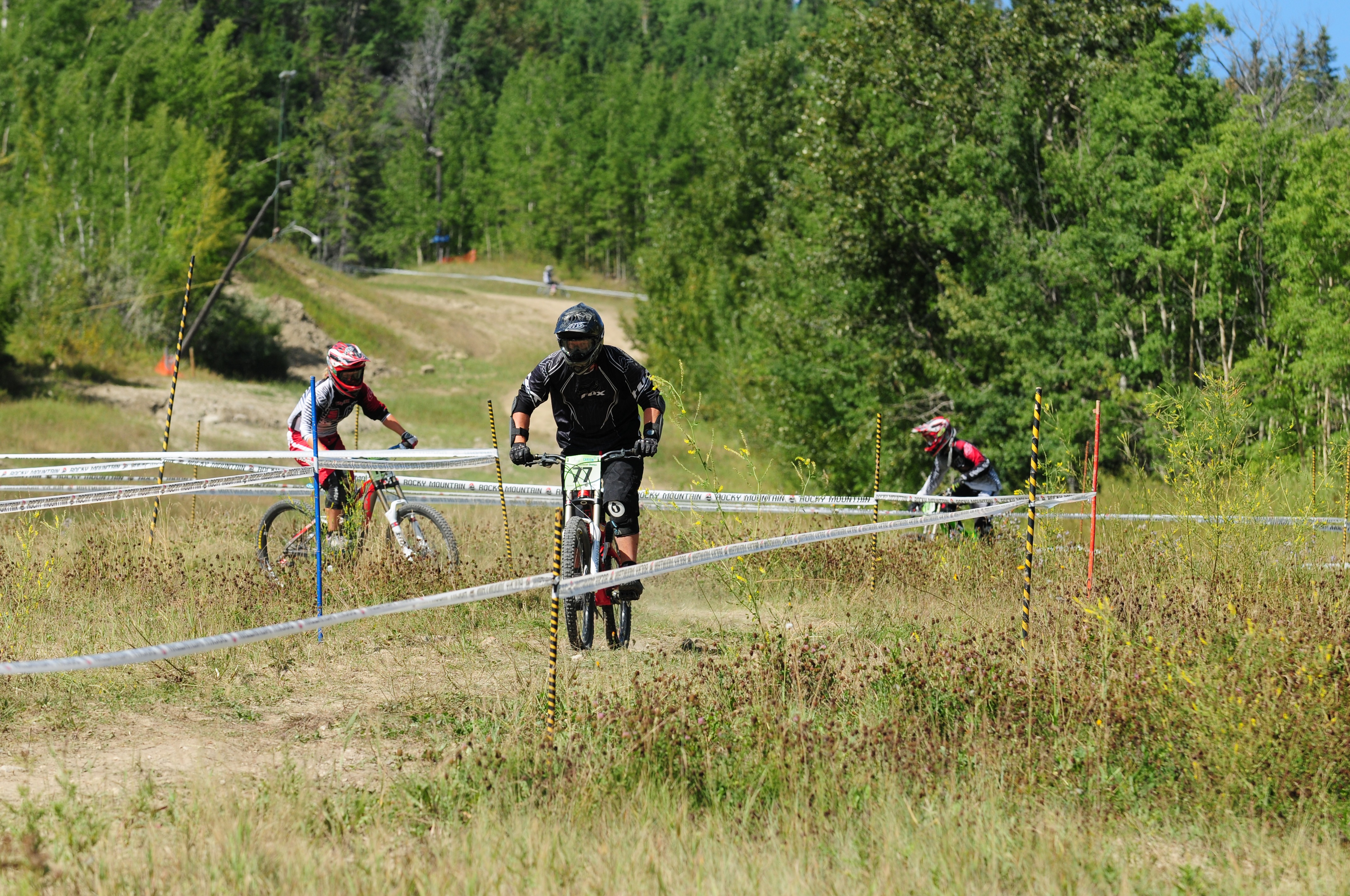 ROUGH TERRAIN- Mountain bike racers practice on the track Saturday to get ready for the provincial championships that took place Sunday at Canyon Ski Resort.