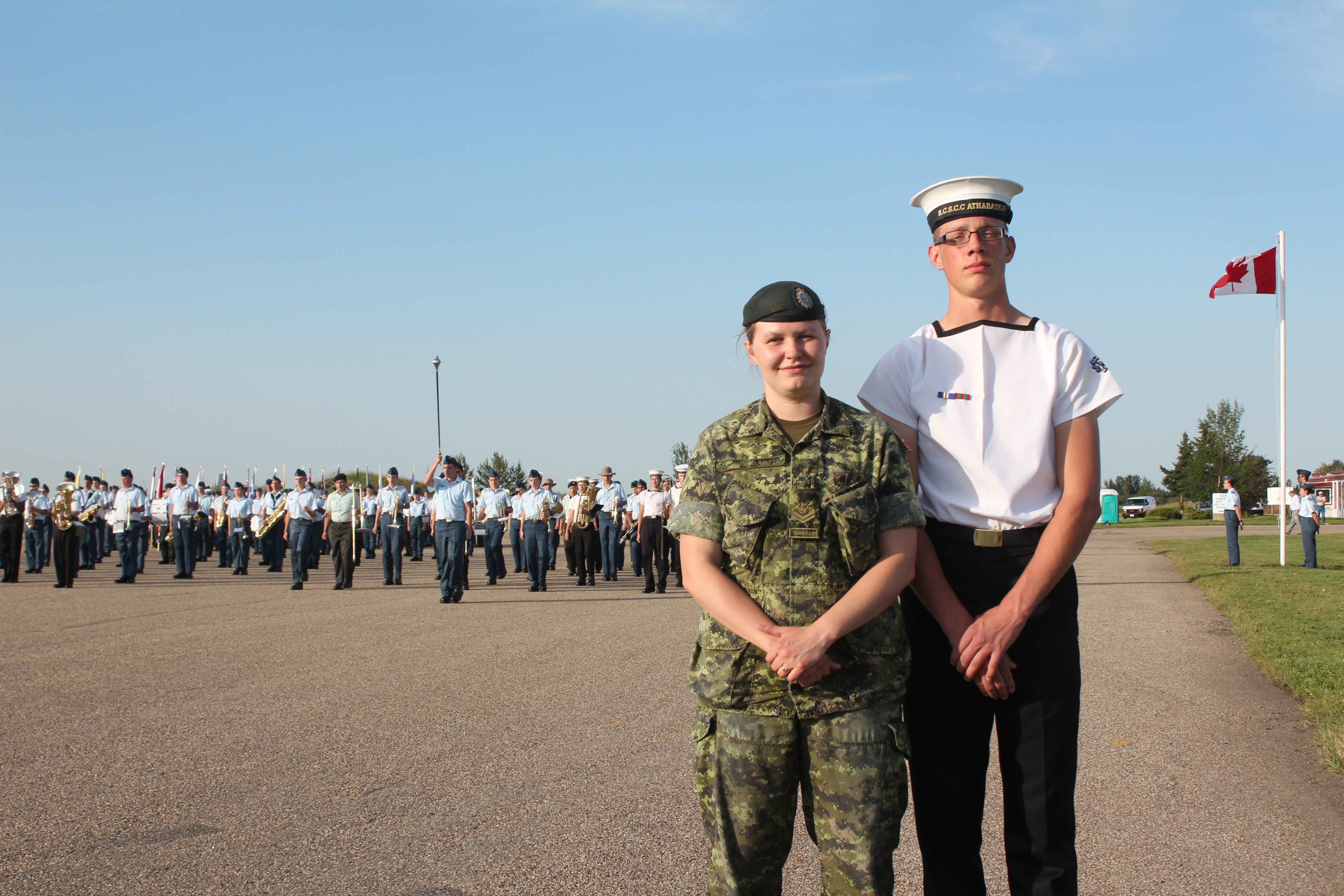 OPEN HOUSE - Master Cpl. Anna Weingartl and Chief Petty Officer 2nd Class Raymond Evans stand together during a sunset ceremony at the open house for the Penhold Cadets recently.