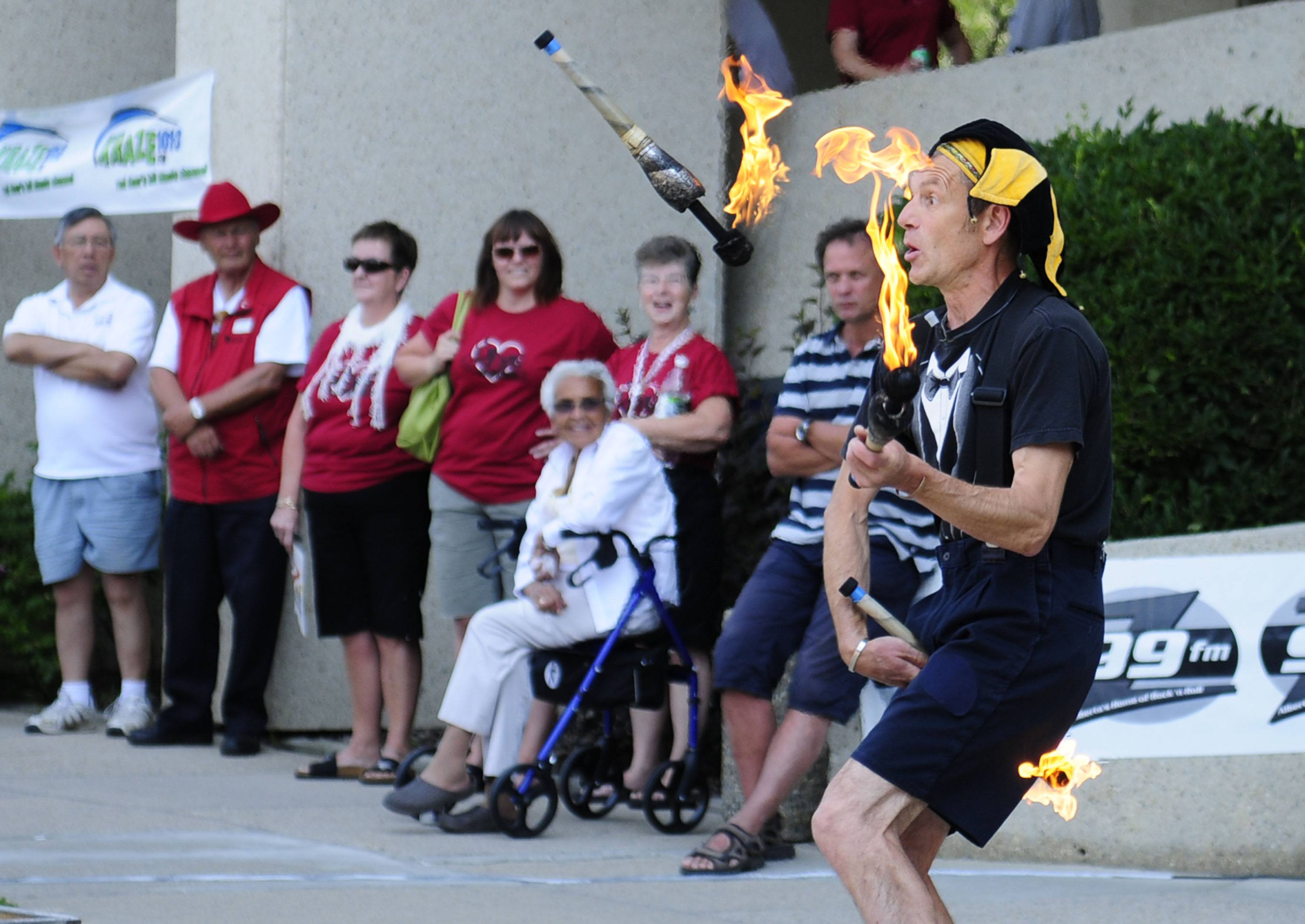 DARING- Audiences flock to see one of the many performers at CentreFest last year in the City’s downtown core. This year’s event runs July 30-31.