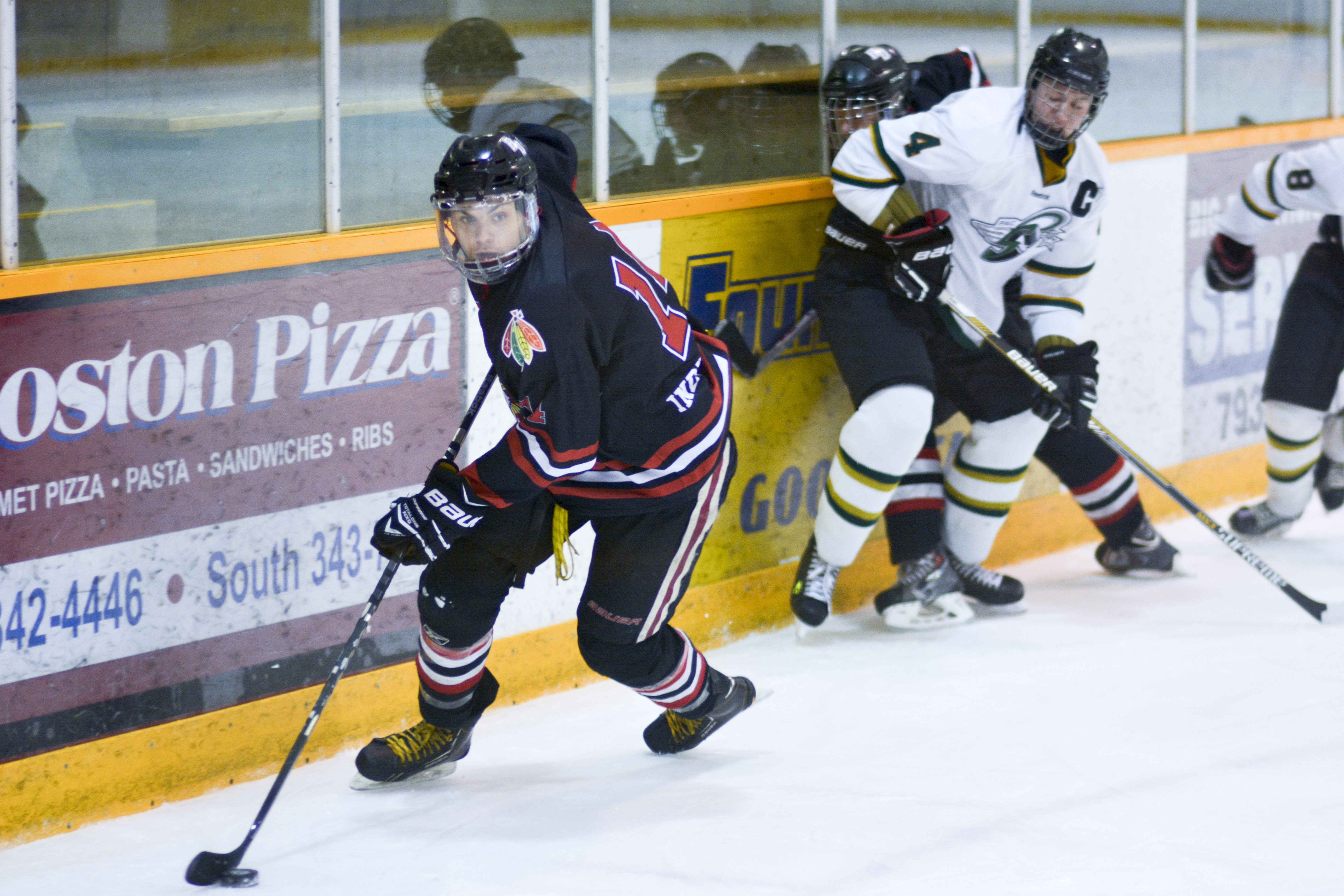 SOLID EFFORT – The Red Deer Indy Graphics Chiefs hosted the Midget ‘AA’ provincial tournament last weekend where they faced the Calgary Royals in the final game. Chiefs forward Tanner Zentner recovers the puck after a teammate gets pinned. The Chiefs face Strathmore on home ice this weekend in the league championship match.