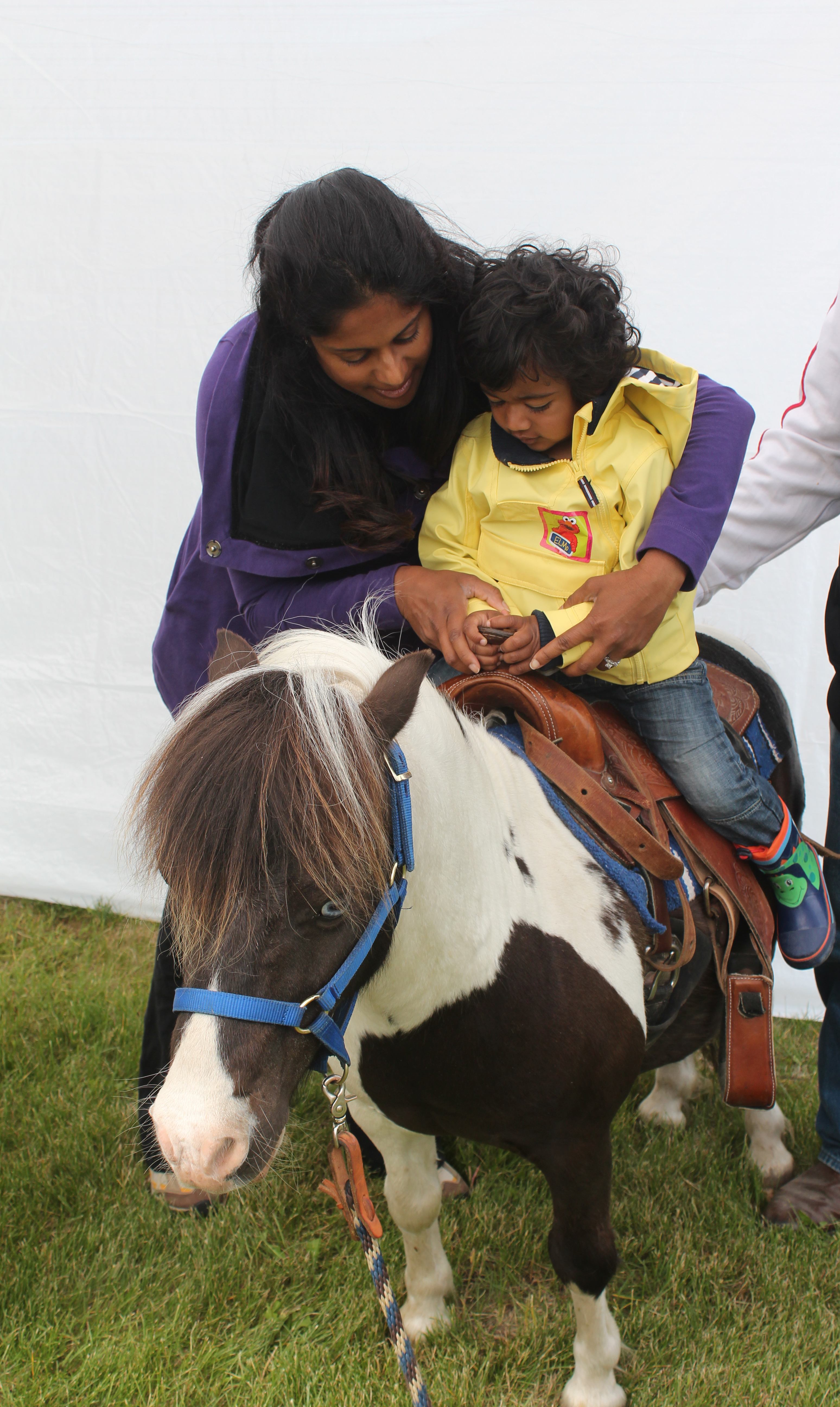 MINI RIDE- Shalini Reddy helps her son Eashan Reddy-Appalraju