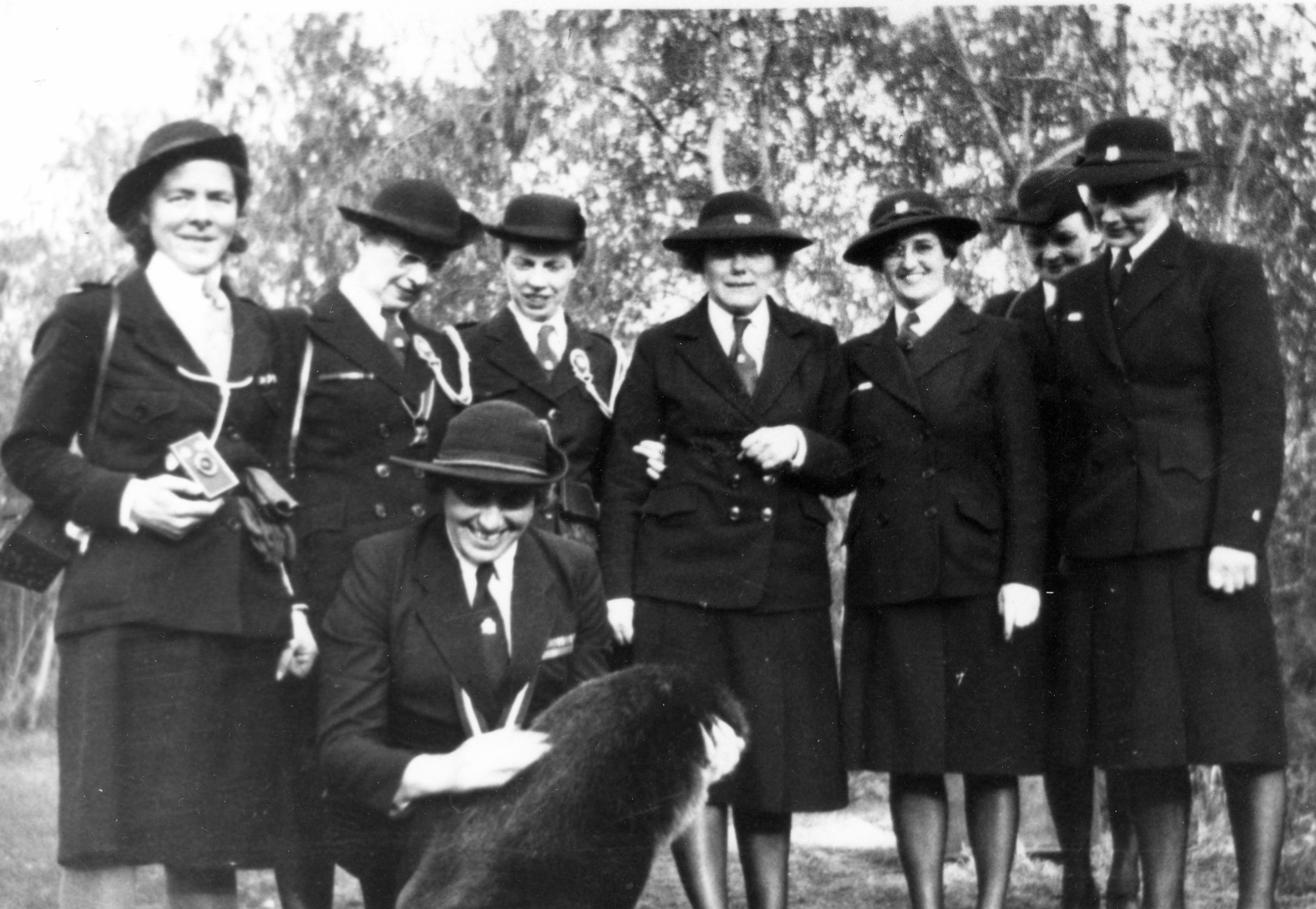 Lady Olave Baden Powell holding Mickey the Beaver during a trip to Red Deer in 1946.