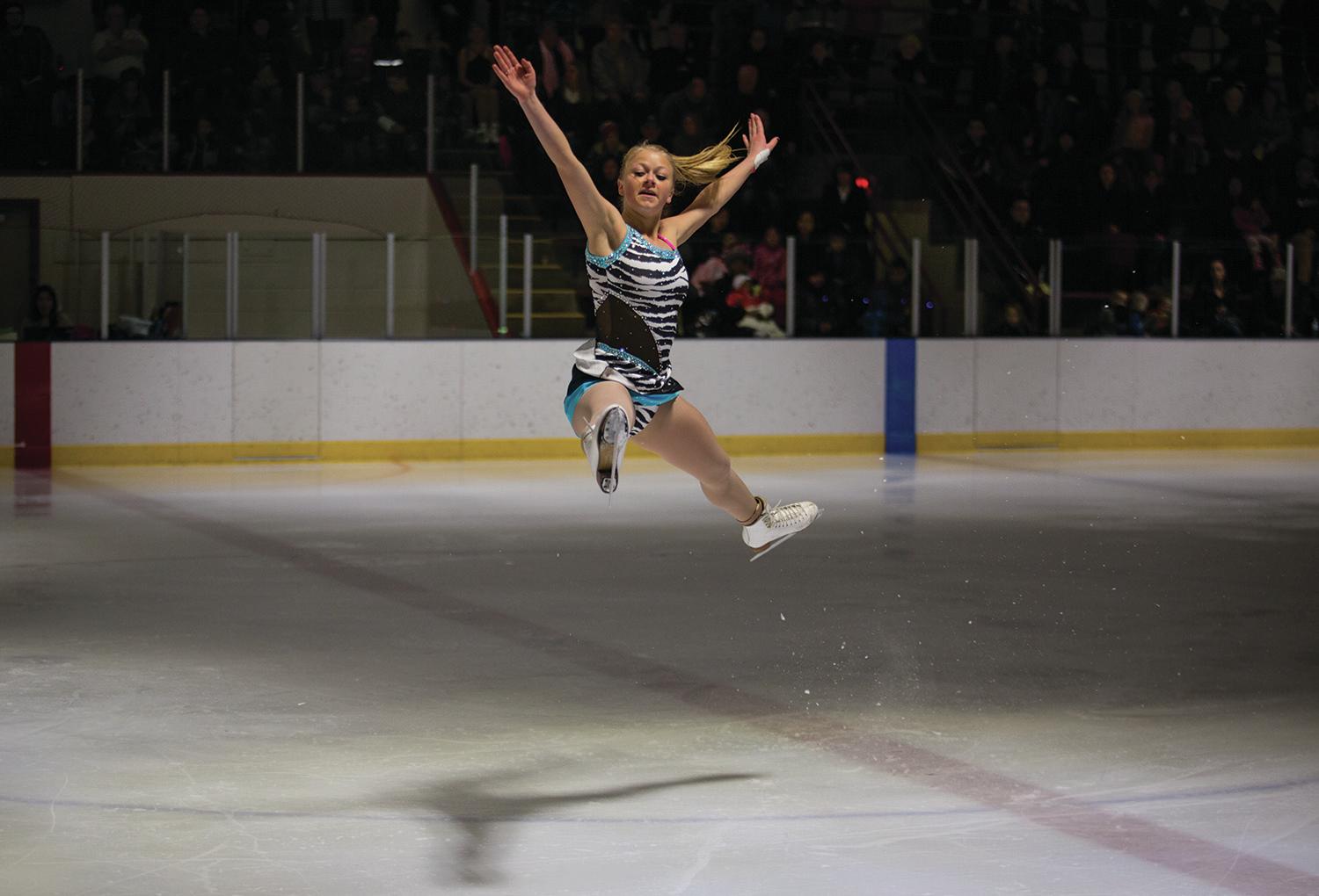 FOCUS - Amy Severtson completed a jump for one of her routines during the Red Deer Skating Club’s 2015 ‘A Night at the Movies’ show at the Kinsmen Arena in Red Deer last month.