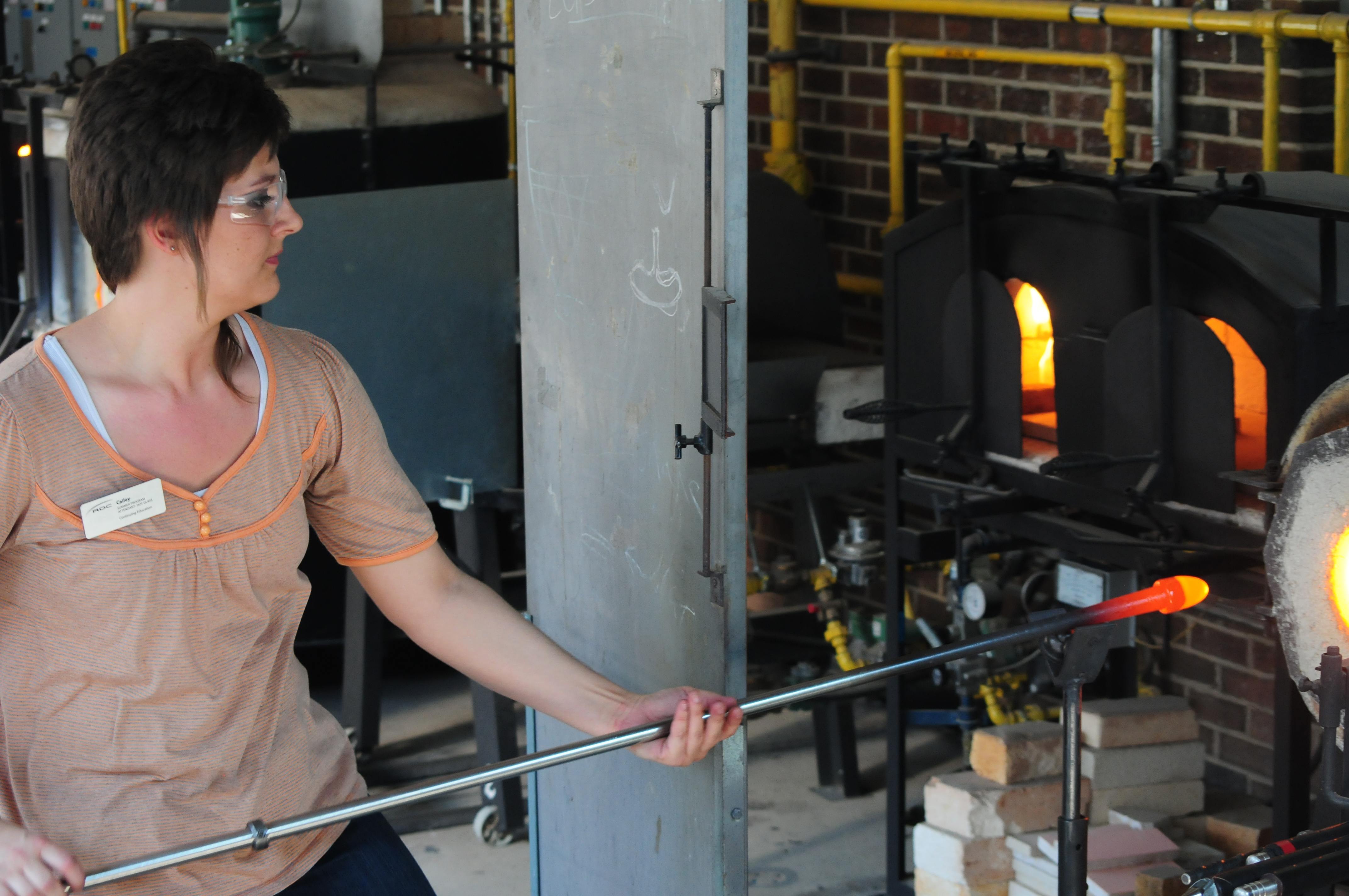 ART- Cailey Buye demonstrates the art of glassblowing at the Red Deer College Friday afternoon.