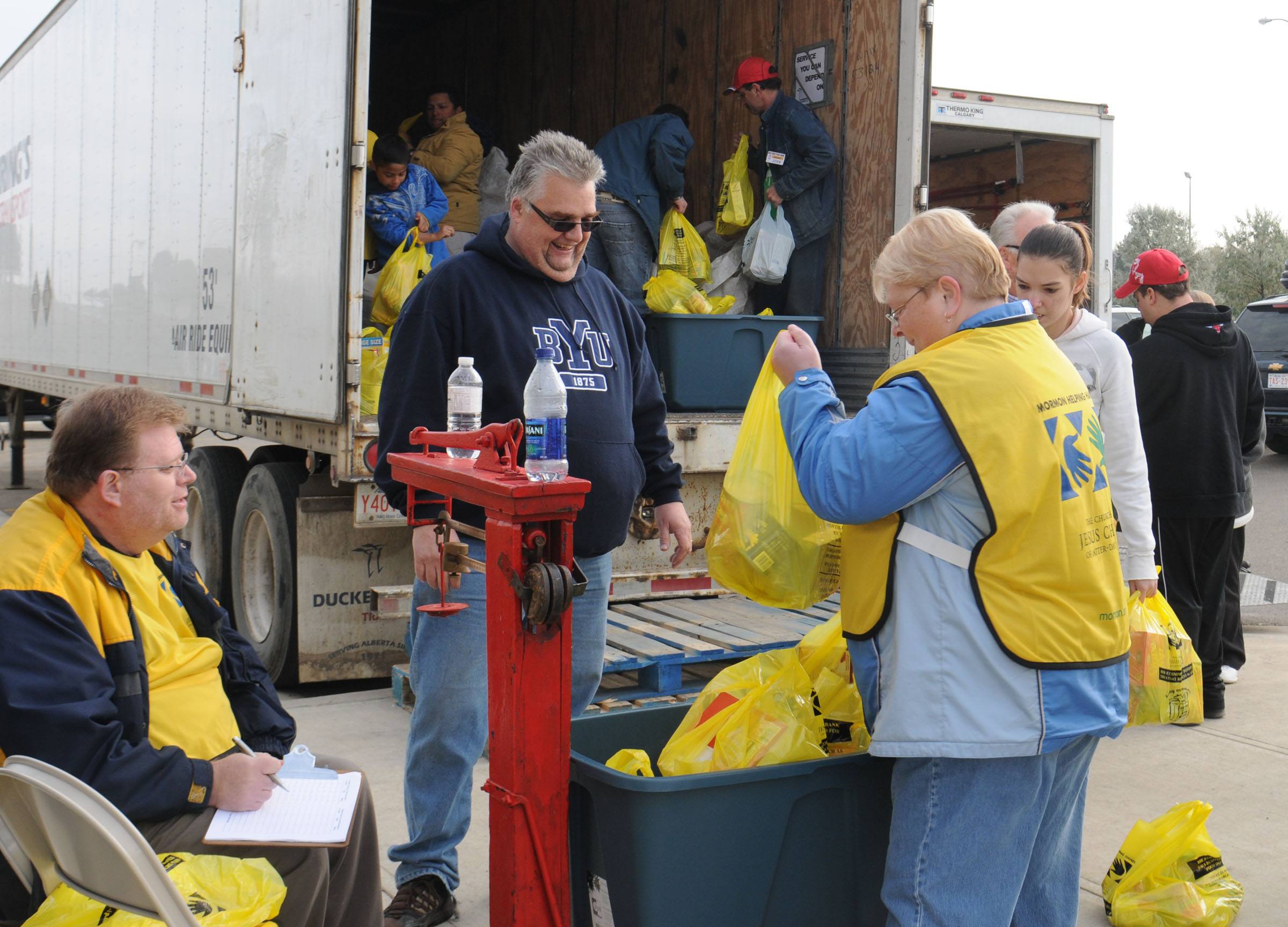 GIVING BACK- Members of the Church of Jesus Christ of Latter-day Saints in Red Deer were out and about Saturday collecting food for the local food bank in selected areas of the City.  They collected 18