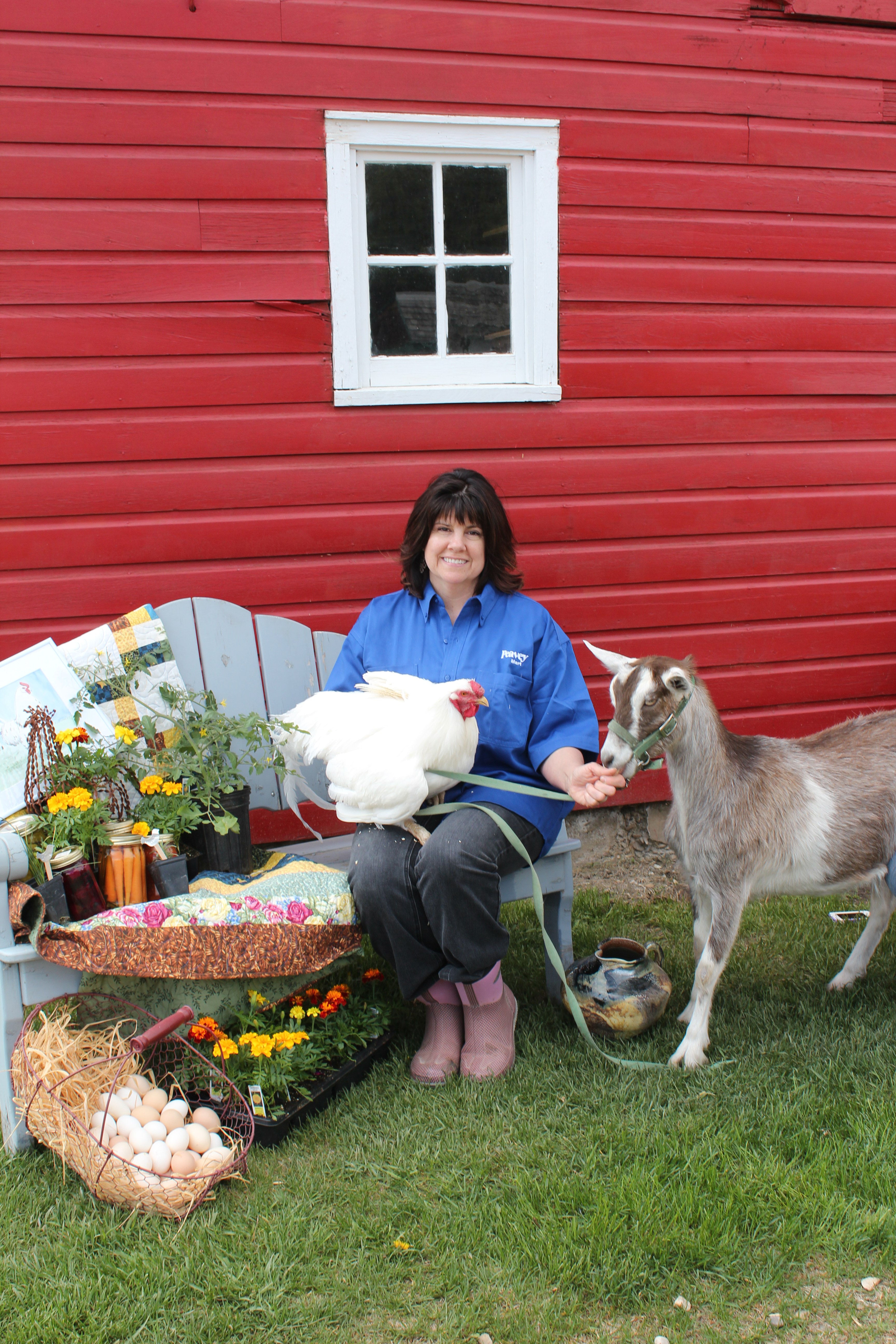 FARM FRIENDS - Liz Munro holds Casanova while feeding Daisy at Sunnybrook Farms. Munro