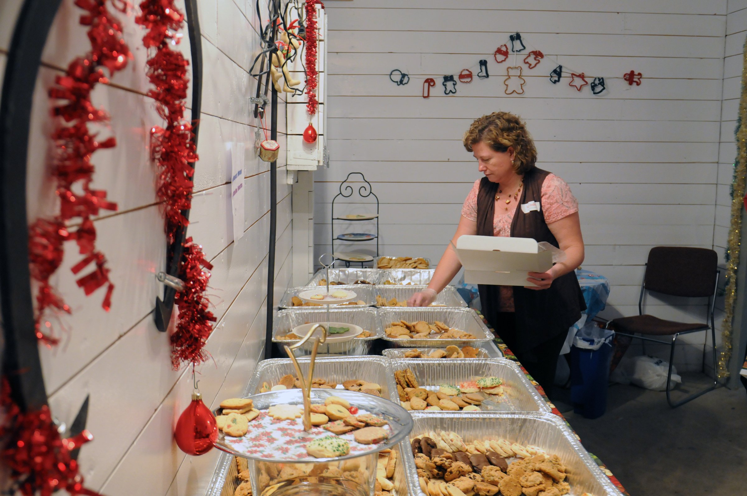 COOKIE WALK-Faye Pethick sorts out some cookies during the famous cookie walk in Markerville during their Christmas in Markerville event this past weekend.