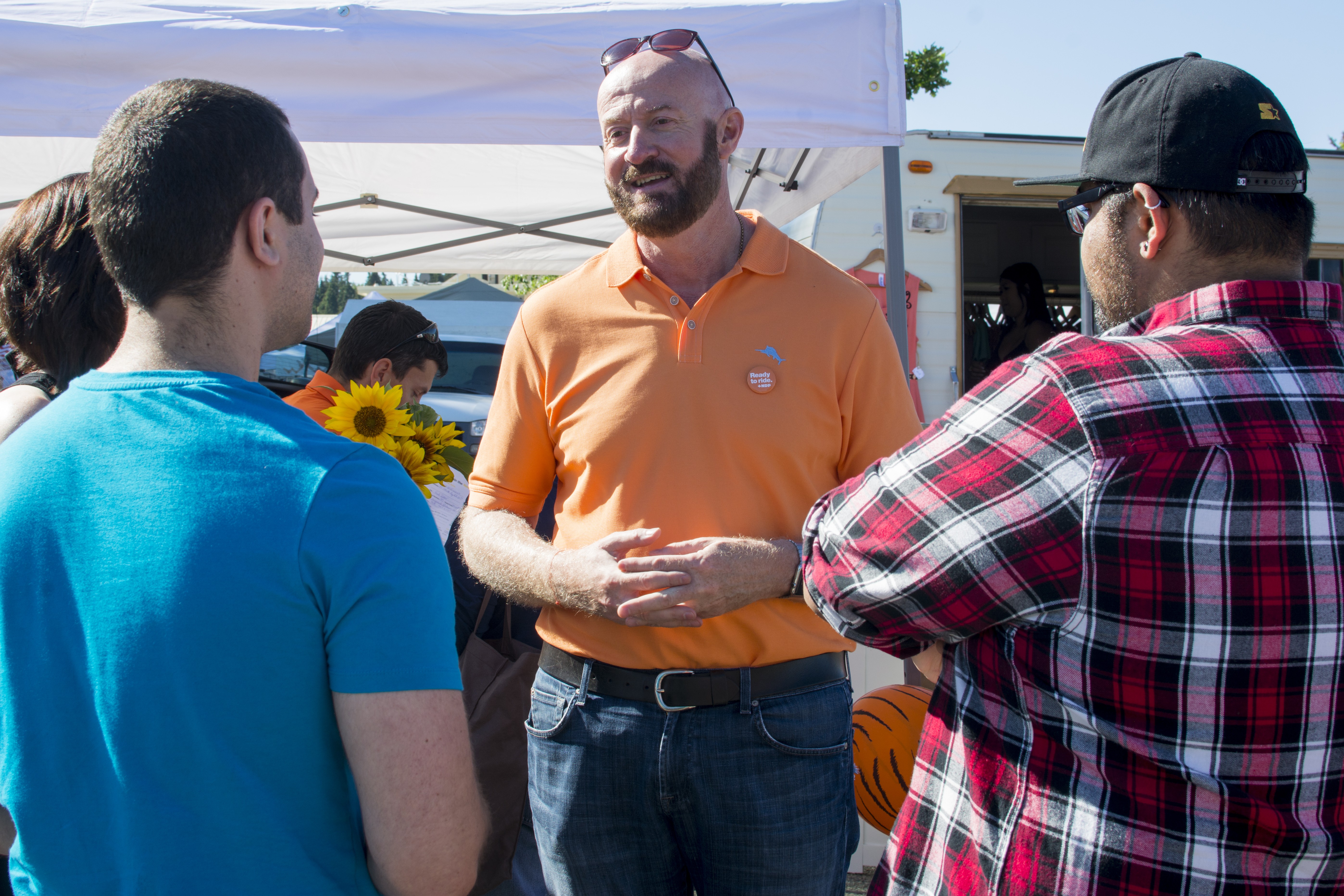 DIALOGUE – City Councillor Paul Harris chats with constituents at the Red Deer Farmer’s Market this past weekend. Harris is seeking the NDP nomination for the Red Deer – Mountain View riding.