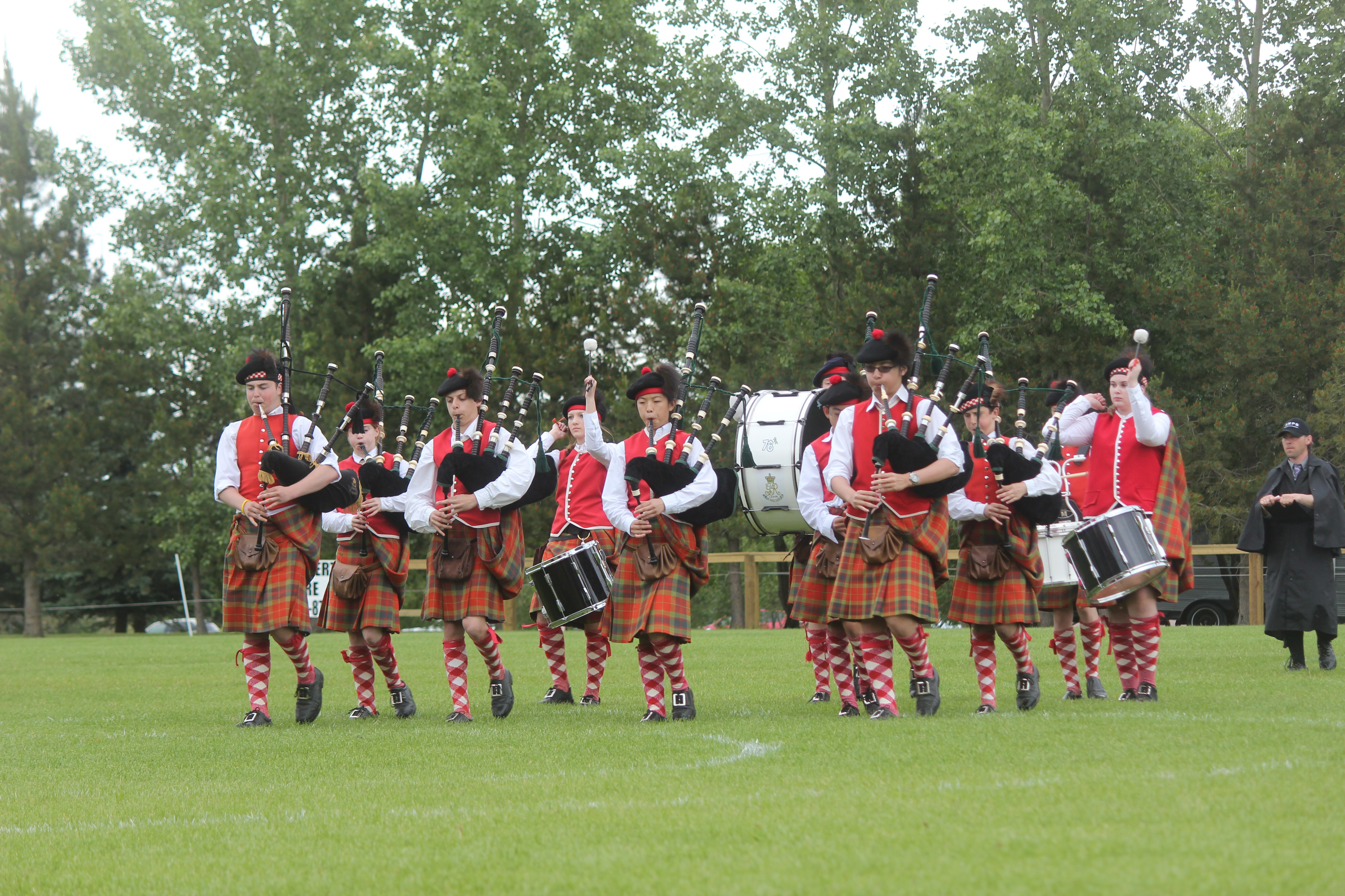 ALL TOGETHER- The 78th Fraser Highlanders Pipe Band took the field at this year’s 65th Annual Red Deer Highland Games at Titians Park this past weekend.