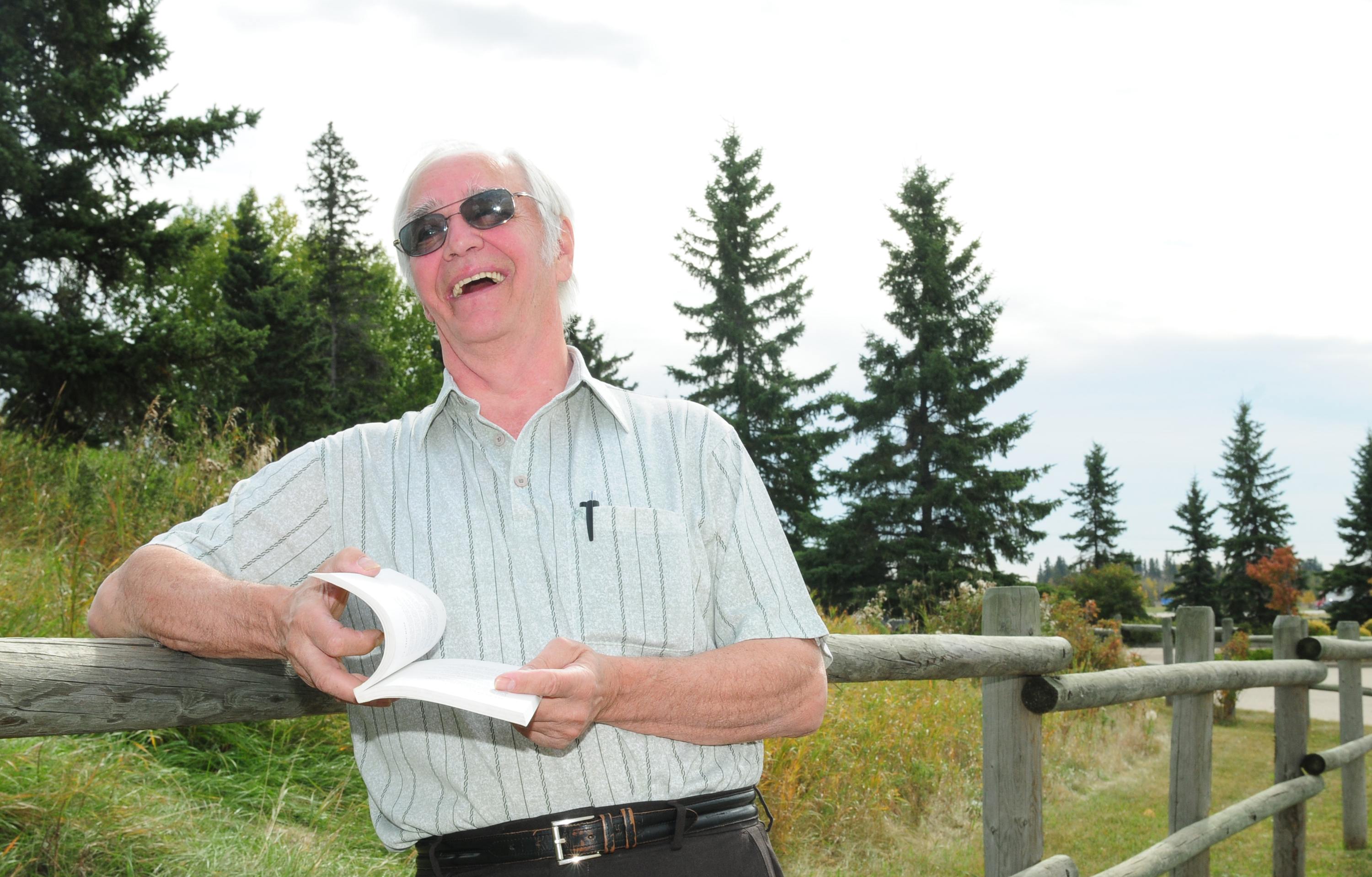 JOYFUL LAUGHS- Red Deer sports poet Frank Pavlick reads one of his more humourous poems from one of his many books.