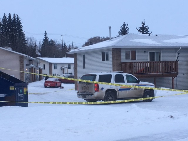 INVESTIGATION - RCMP currently have a residential area off 43rd St. taped off. Police are examining a red car parked in the middle of the parking lot.
