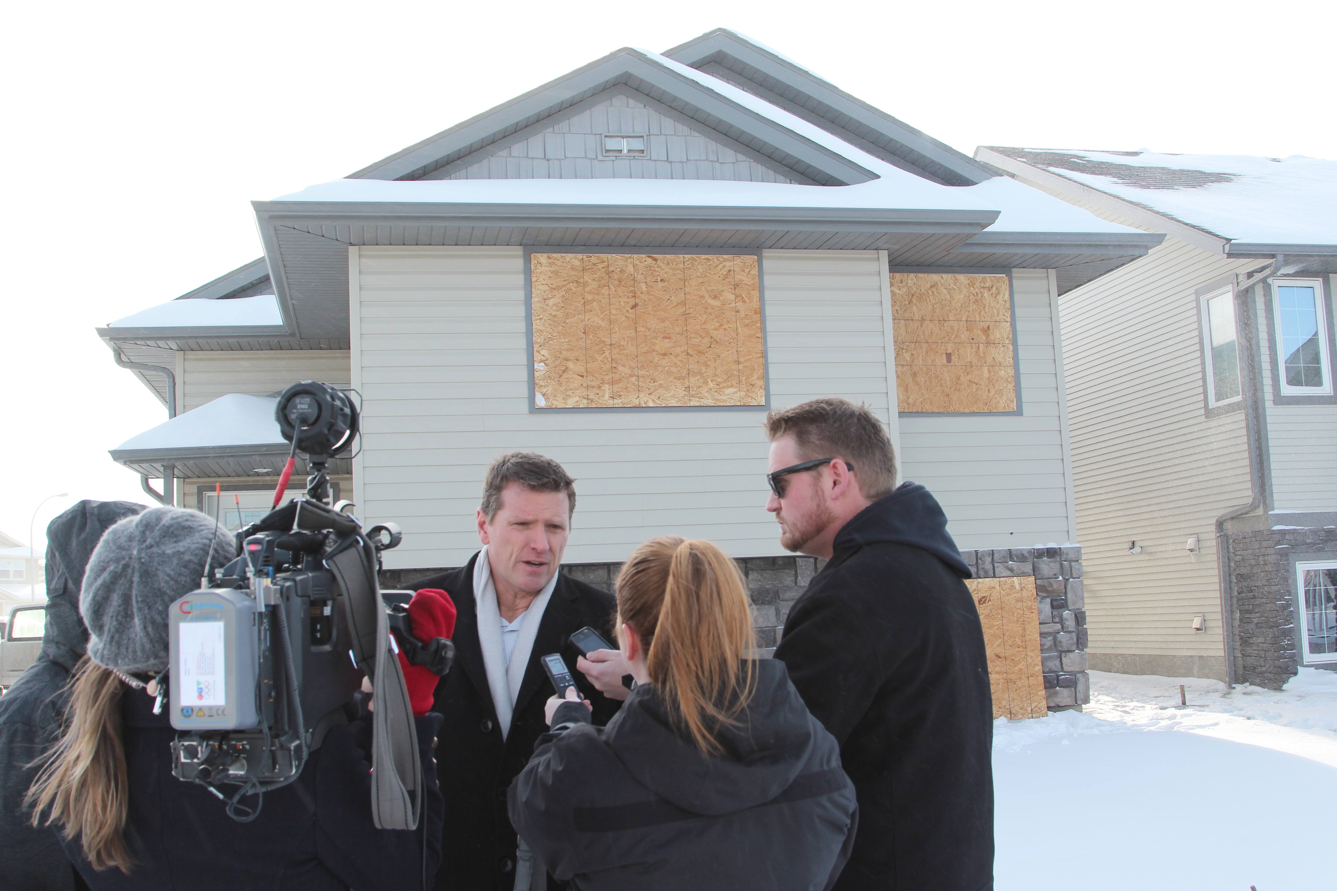 CLOSURE - Safer Communities and Neighbourhoods (SCAN) Unit Manager Billy Kerr talks to media outside a home in Inglewood that was boarded up yesterday. A Community Safety Order was placed for the home after numerous complaints of suspicious activity by neighbours were received.