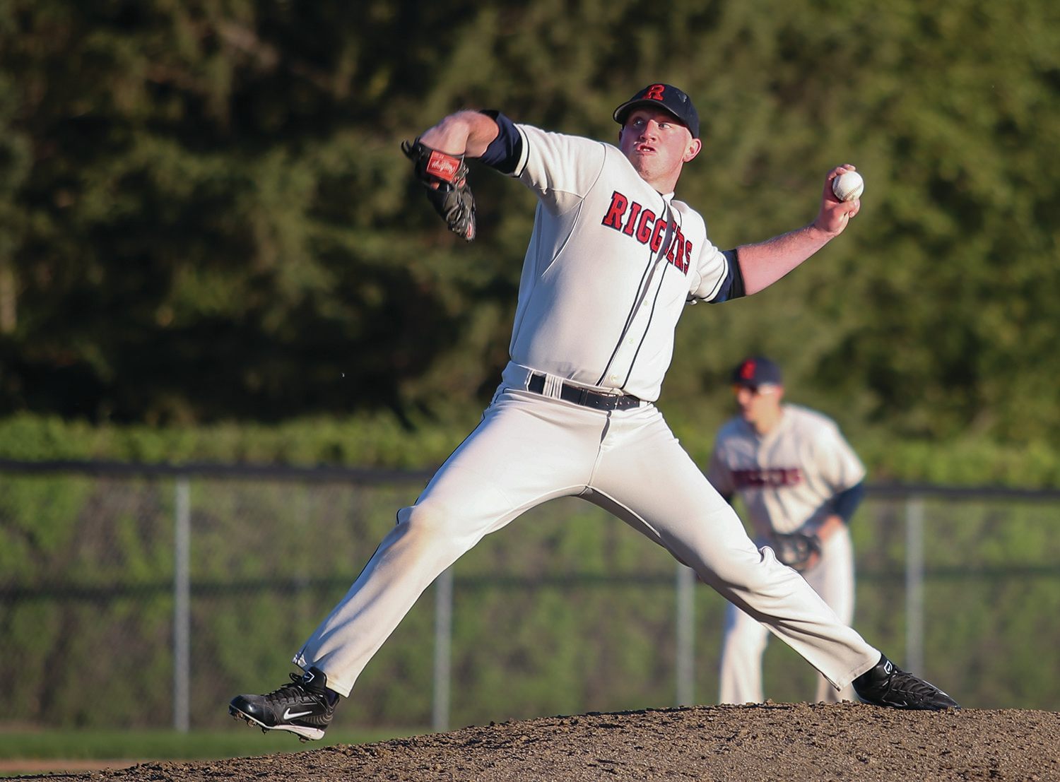 BRING THE HEAT - Red Deer Riggers’ pitcher Josh Edwards threw a strike during a home game earlier this season. The Riggers won their home tournament last weekend.