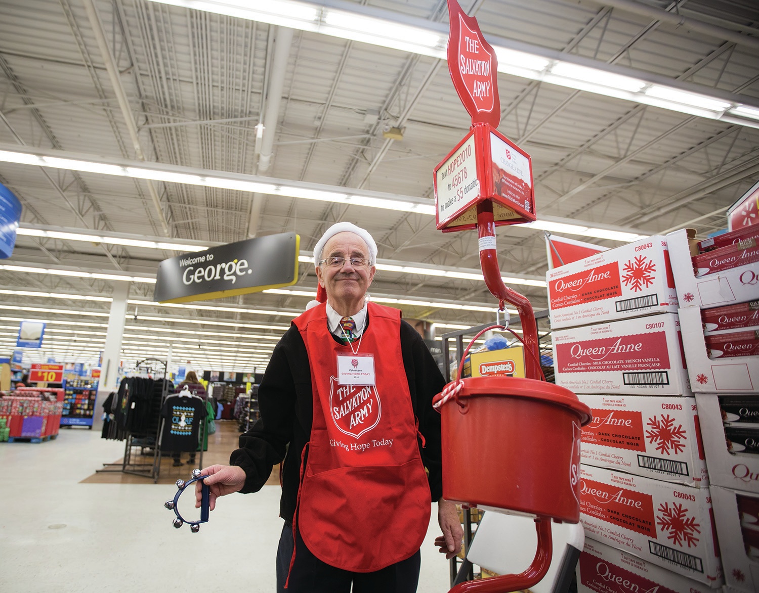 JINGLE JINGLE - Volunteer Ron Mepham tended his Christmas Kettle for the Salvation Army at the north Wal-Mart earlier this week. Mepham is one of a brigade of volunteers who have been manning kettles throughout the City as part of the Salvation Army’s annual Kettle Campaign.