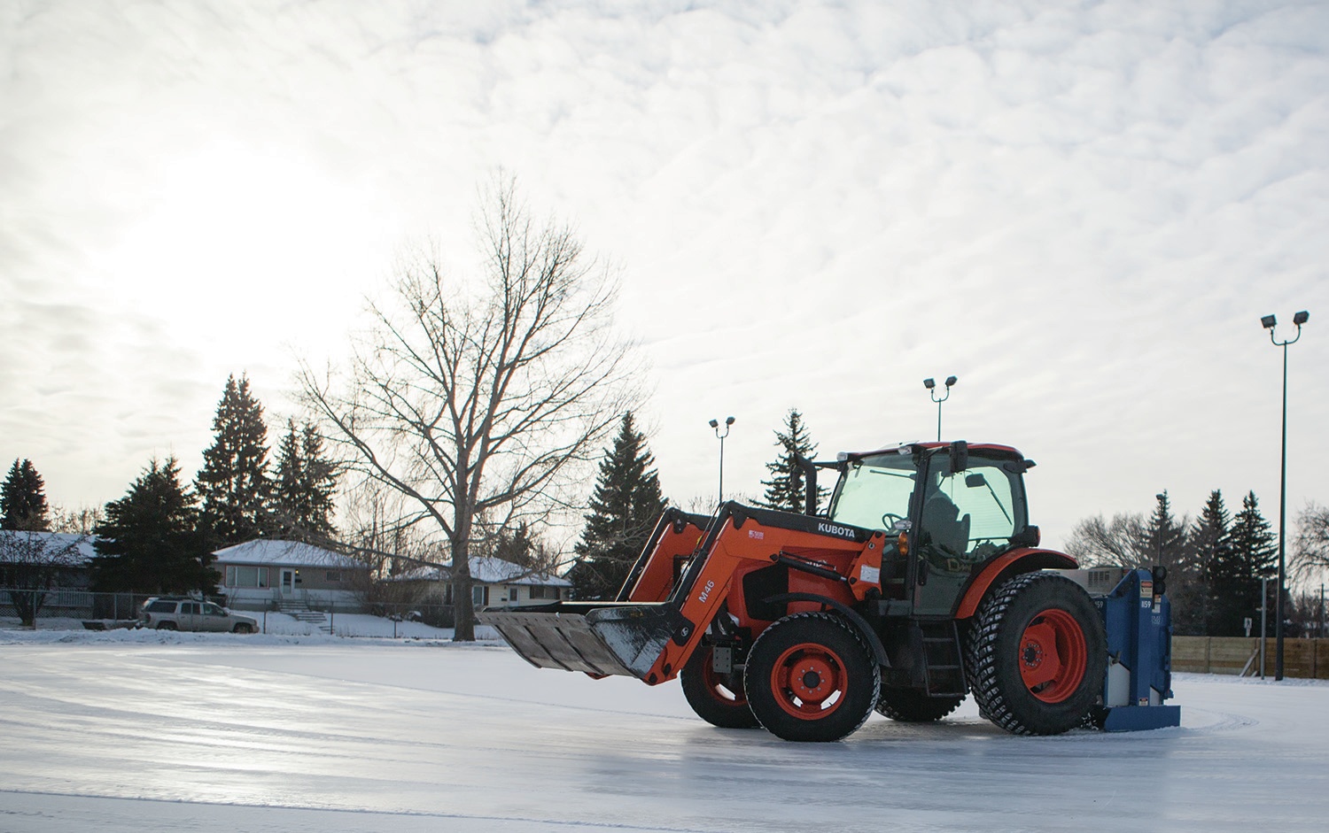 RESURFACE - City crews worked to prepare the outdoor skating surfaces in West Park for public use recently.