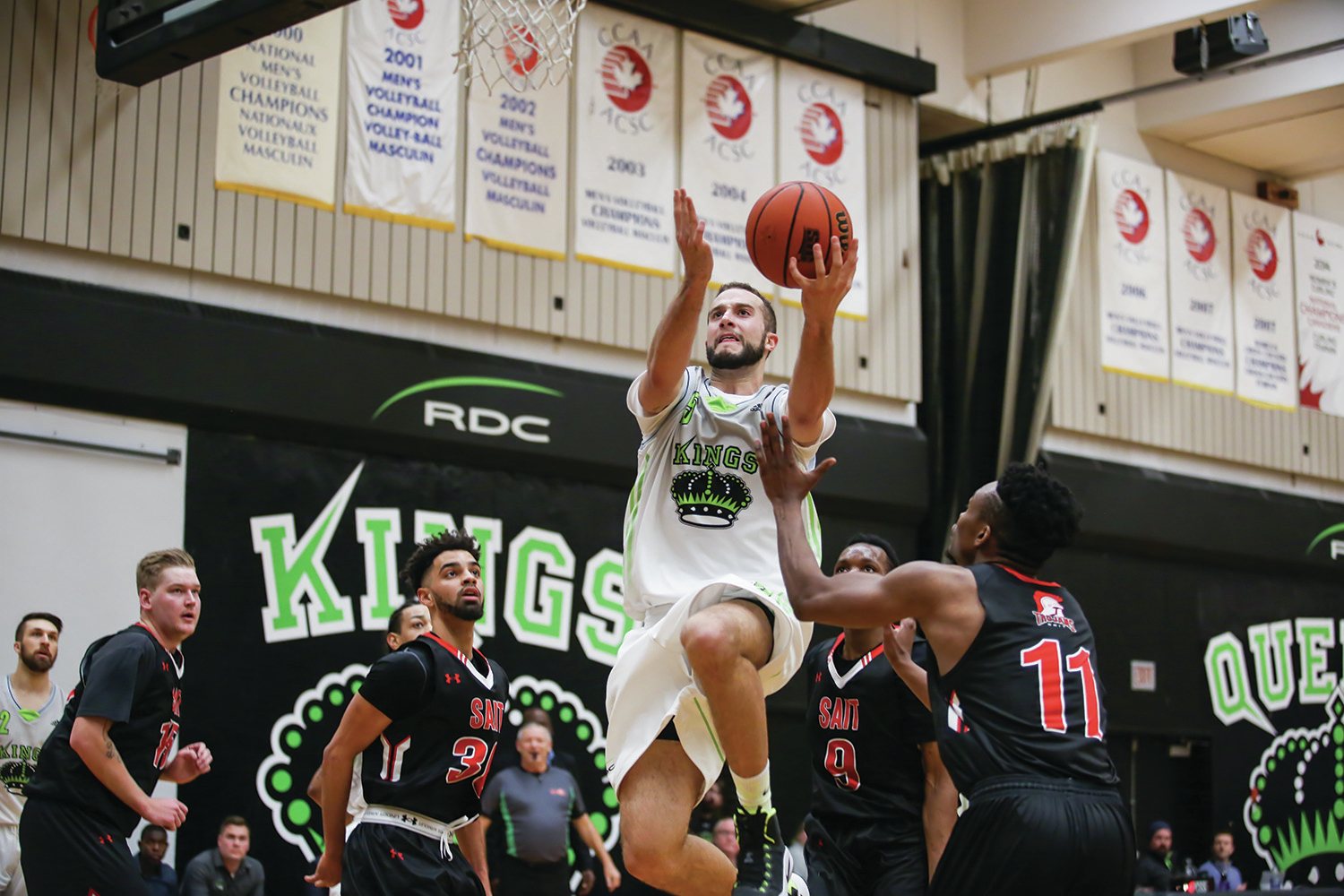 JUMPER - Shayne Stumpf of the Red Deer College Kings Basketball team drove to the net for a layup during a game against the SAIT Trojans at RDC last Saturday. The Trojans won the game by a score of 91-87.
