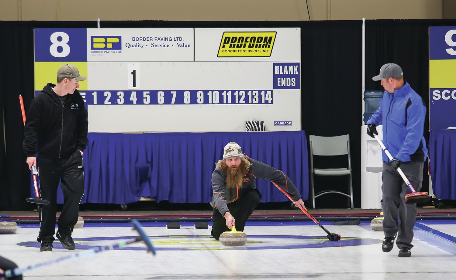 HURRY! - The CVS Controls team swept a rock down the ice during the Red Deer Oilmen’s Bonspiel at the Pidherney Centre.