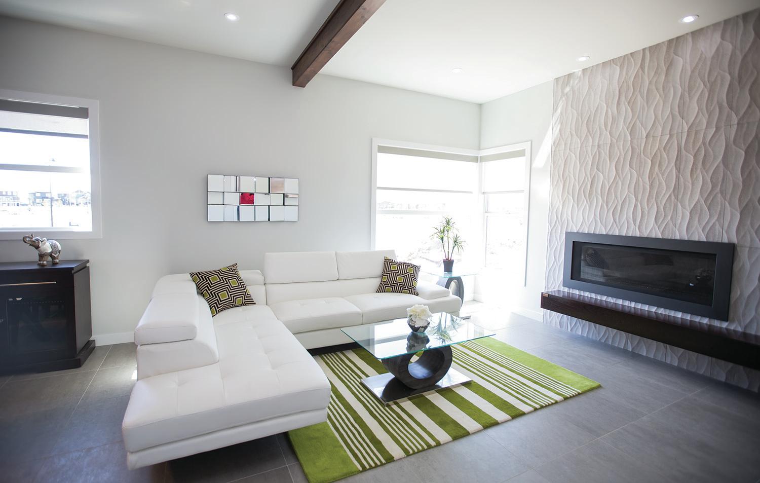 FAMILY ROOM - This bright living room in a Bella Rosa Developments Ltd. show home in Laredo shows how a large window can help bring a space to life.