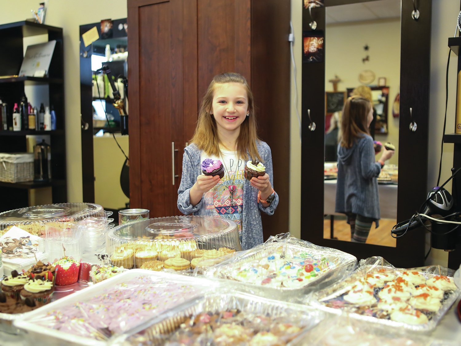 KIND HEART- Jayda Monilaws is selling cupcakes at the Mane Attraction in support of the SPCA on National Cupcake Day in Red Deer today. Funds go towards supporting the animals at the shelter.