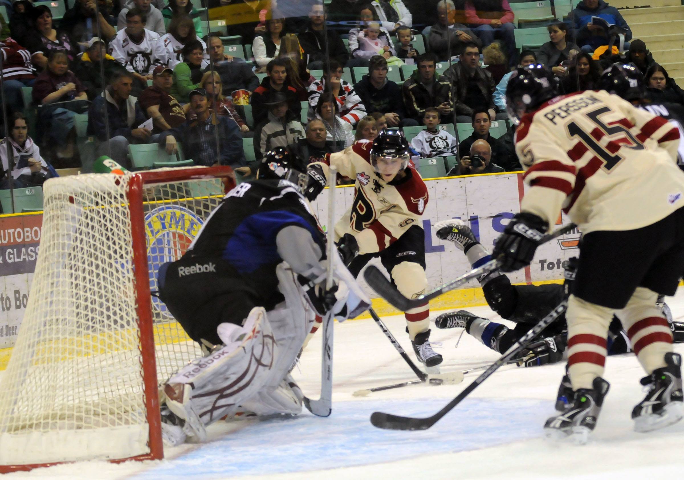 SCORE- The Red Deer Rebels out shot the Swift Current Broncos with a 4-2 win Friday night at the Enmax Centrium. The Rebels scored all four goals in the first period with a total of 35 shots on net.