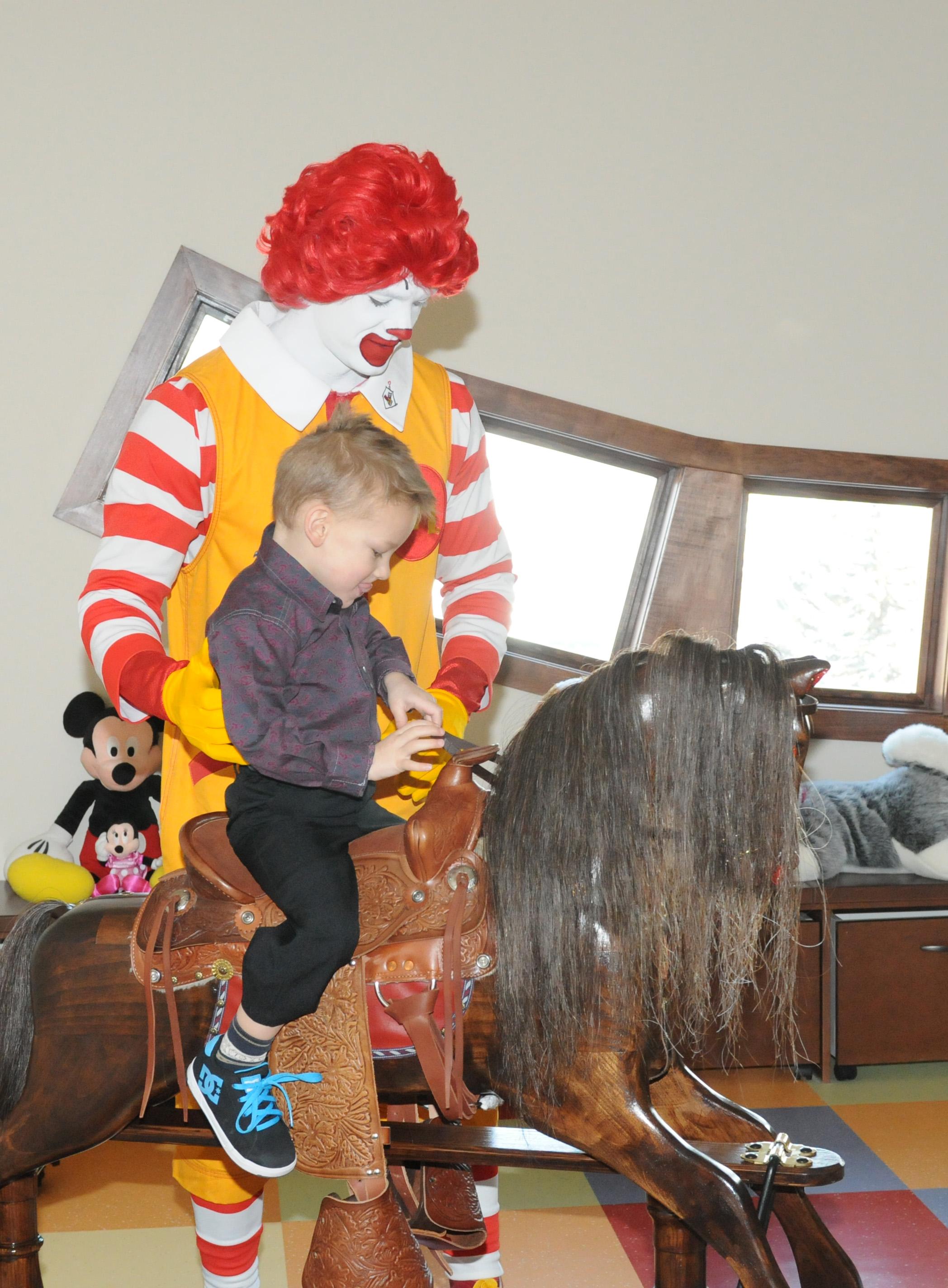 CAREFREE- Ronald McDonald was the life of the party during the grand opening of the Ronald McDonald House as he played with Boyd Moore