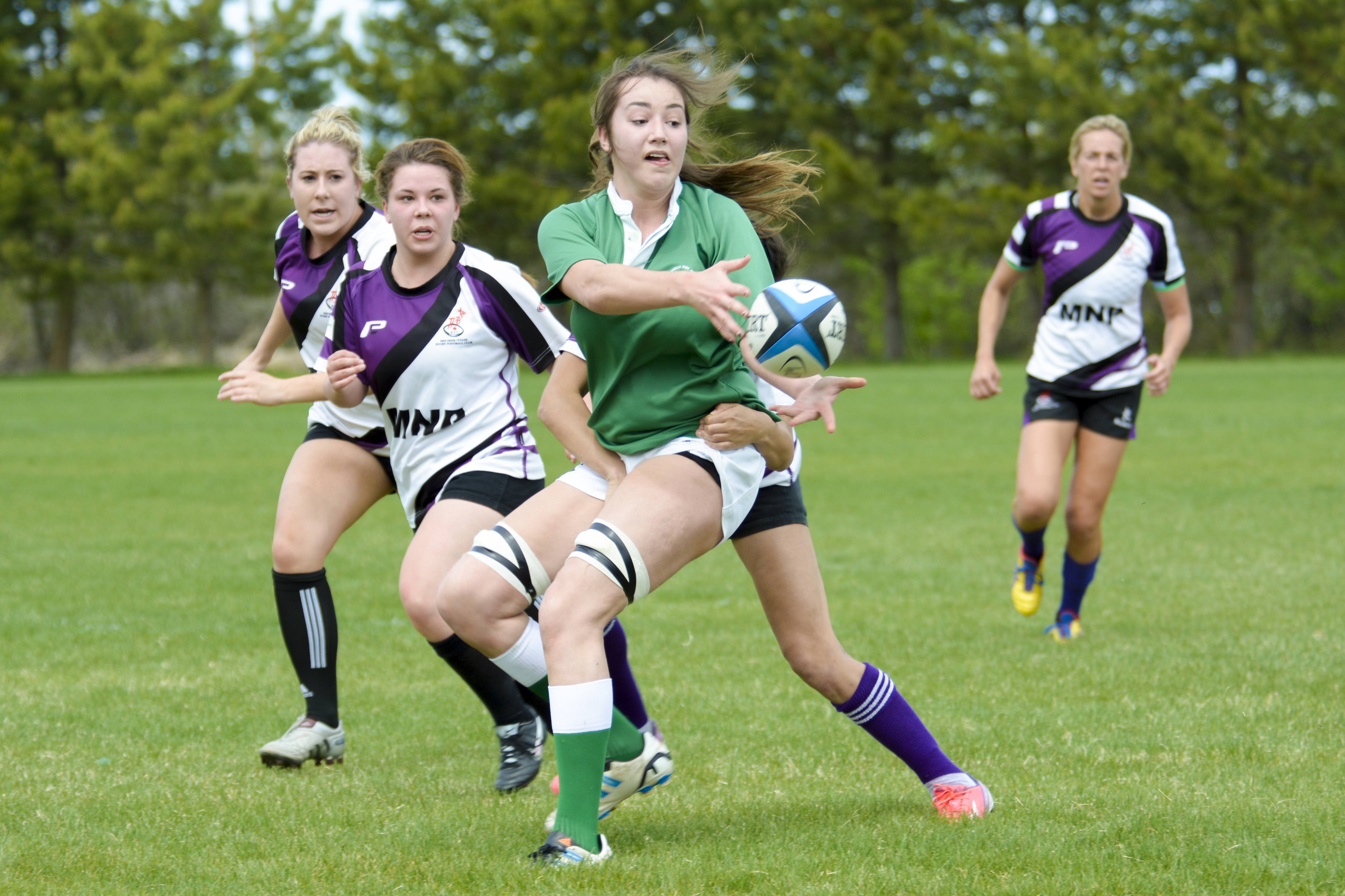 ACTION PACKED FUN – A hoard of Titans descend on an opponent during a match last May.