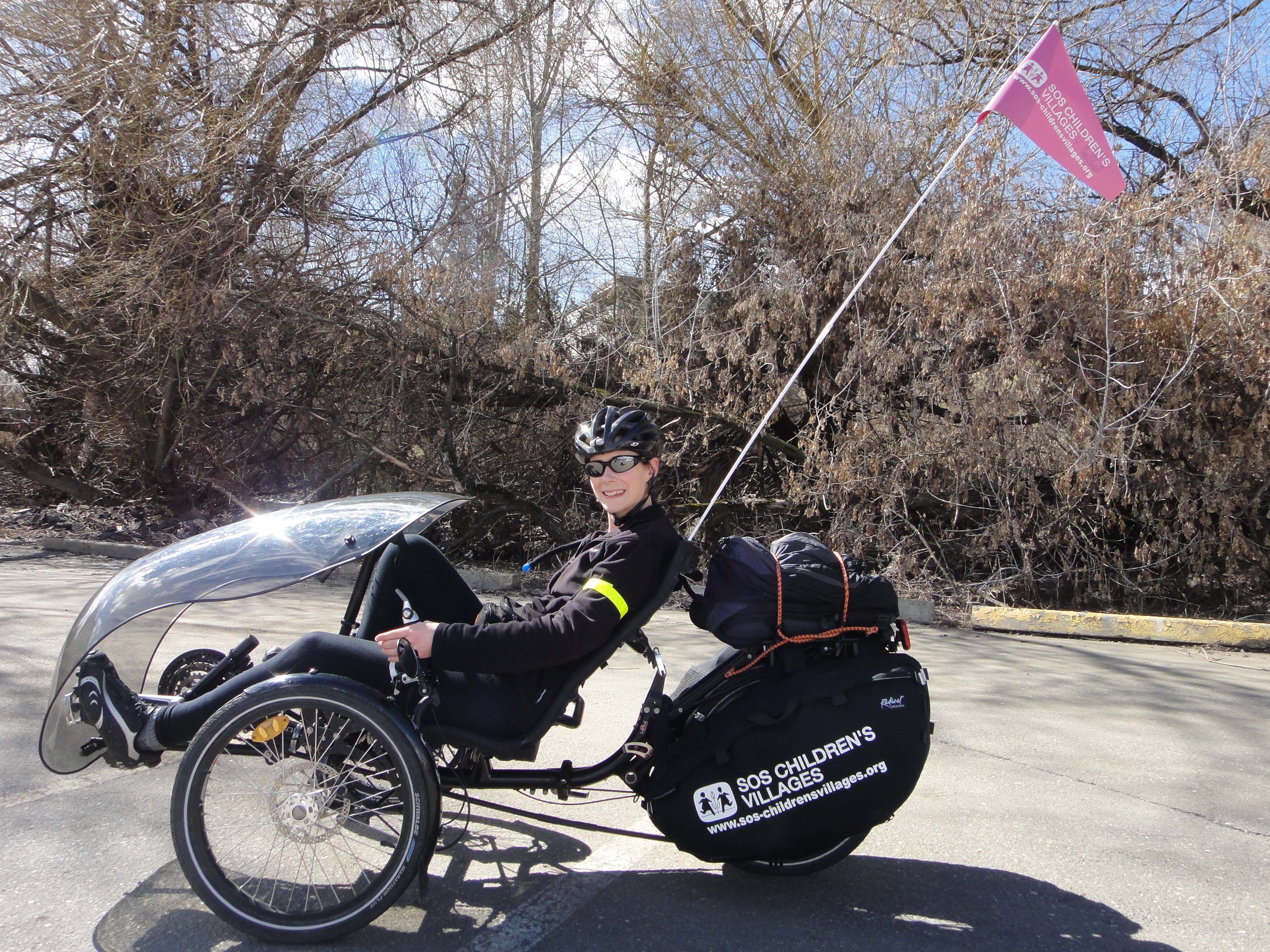 MEANINGFUL JOURNEY – Tana Silverland poses on her recumbent tricycle which she is riding across the country in hopes of raising awareness for SOS Children’s Villages