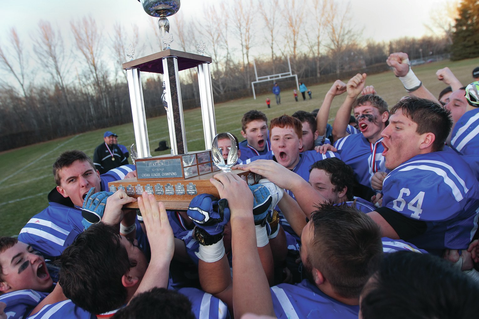 CELEBRATION - The Hunting Hills Lightning celebrated their CASAA League championship win over the Notre Dame Cougars at Great Chief Park last weekend. The Lightning won the game by a score of 29-7.