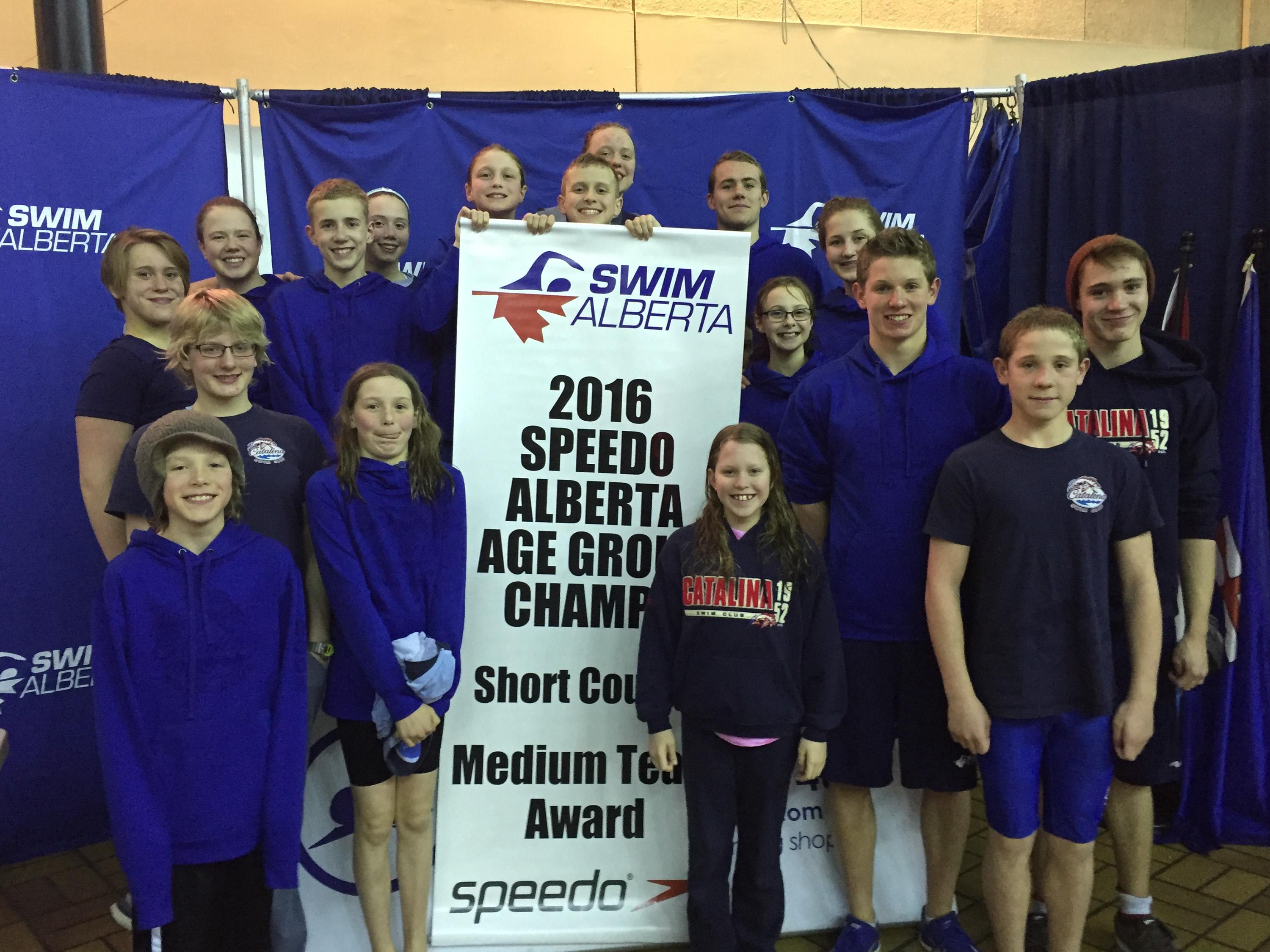 VICTORY - Members of the Red Deer Catalina Swim Club posed for a photo with their Swim Alberta Medium Team Points Award banner