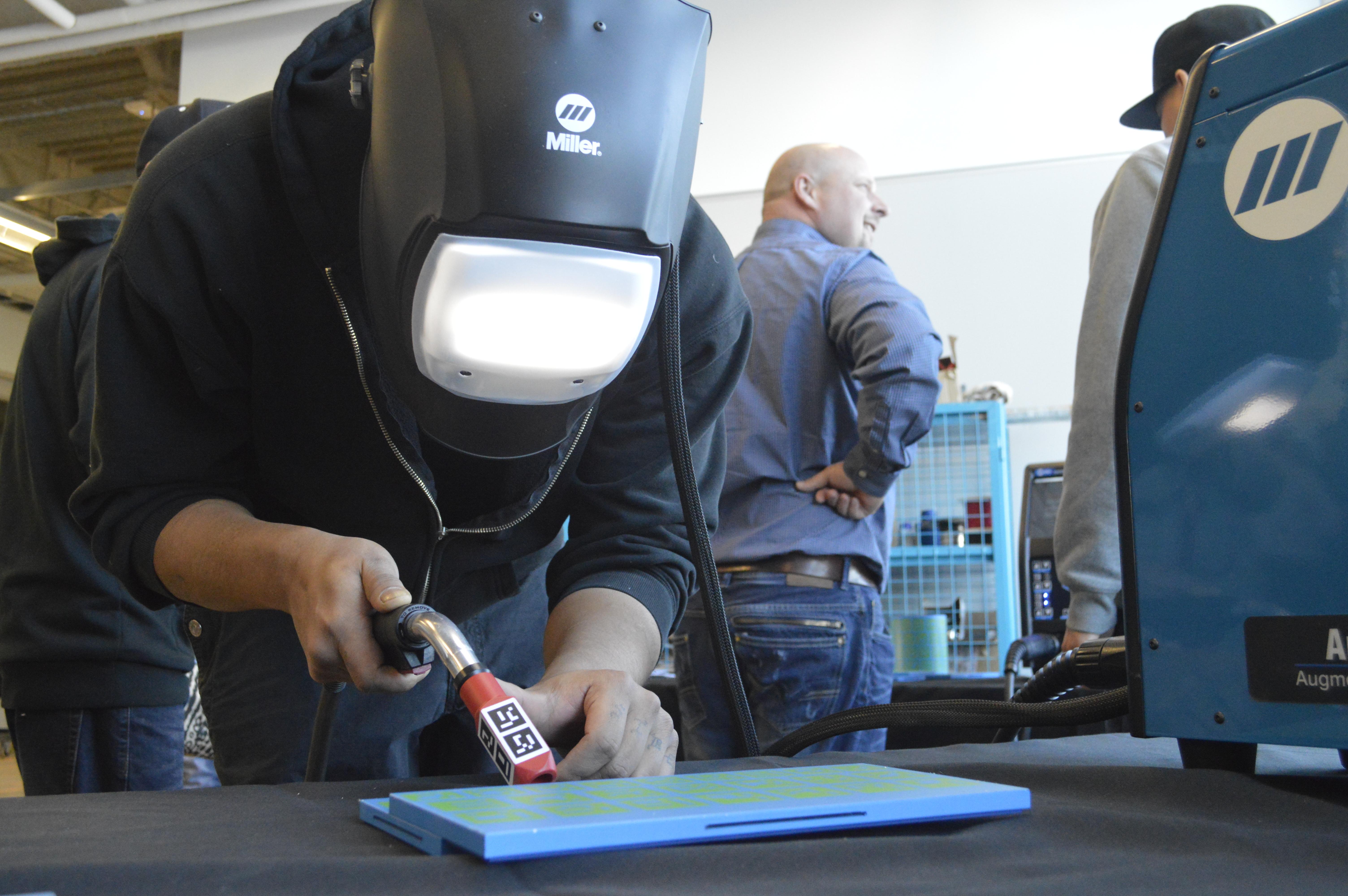 INNOVATION - A demonstration of the virtual reality welding simulators at Red Deer College’s Centre for Innovation in Manufacturing took place on Thursday. Students were on hand to showcase an RDC program that helps Indigenous students gain welding skills and experience in their home — the Montana First Nation.