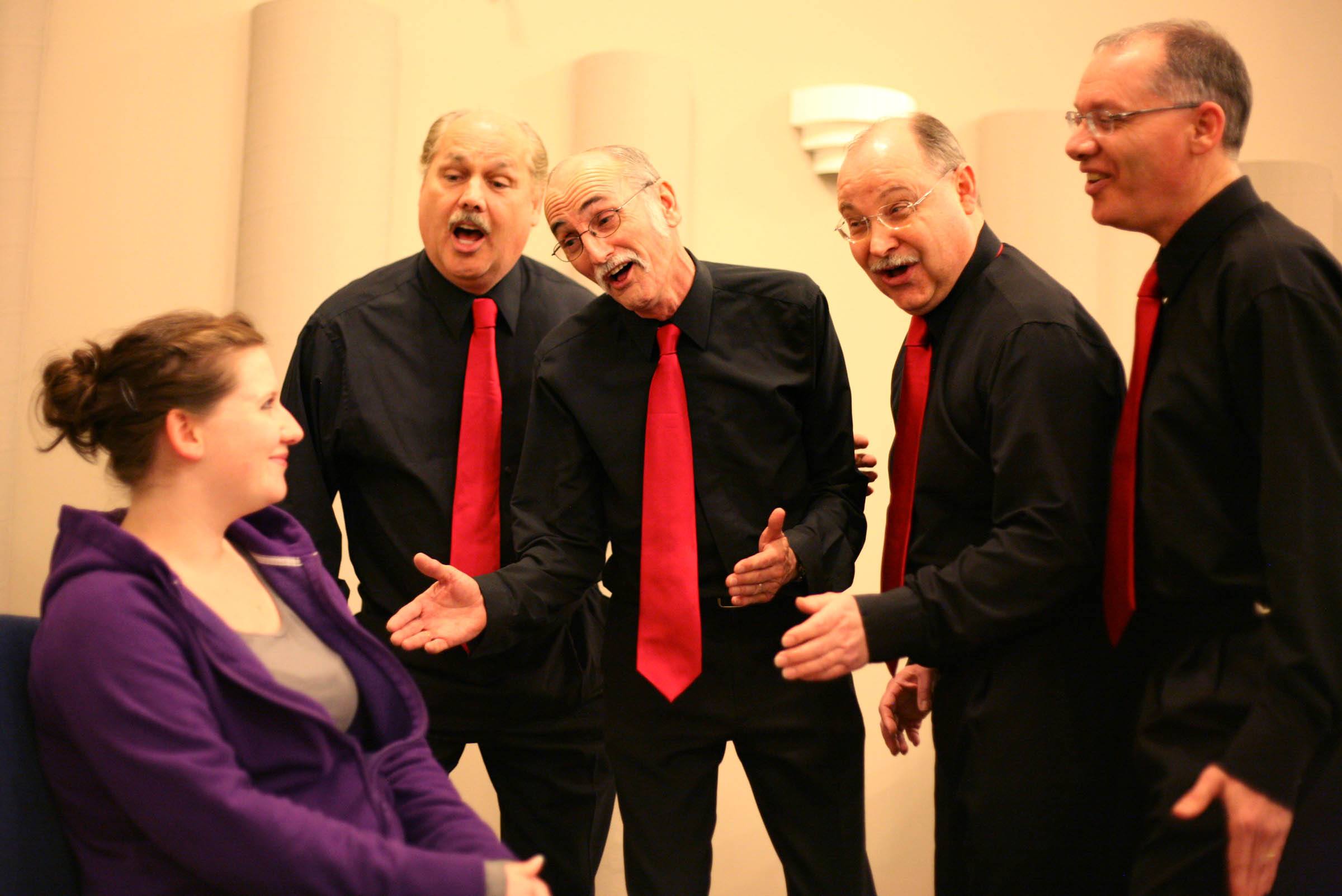 WITH LOVE- The Wild Rose Harmonizers Barbershop Chorus strike up a tune for a lucky lady during last year's Valentine's Day serenades.