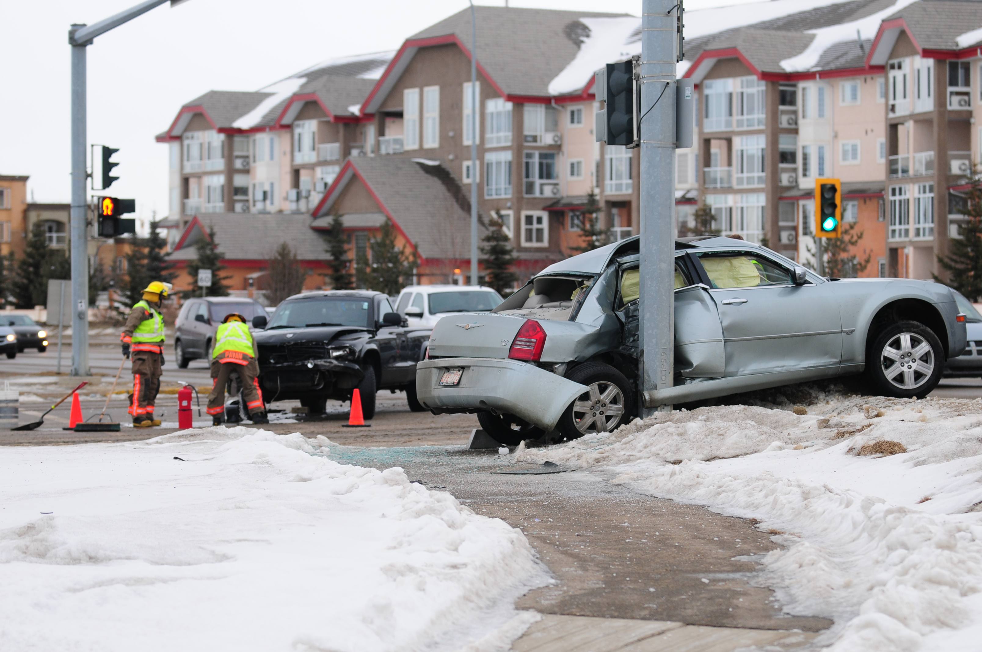 SQUASHED- A car sits crunched against a light post at the intersection of Taylor Dr. and 45 St. Monday morning. No injuries were reported