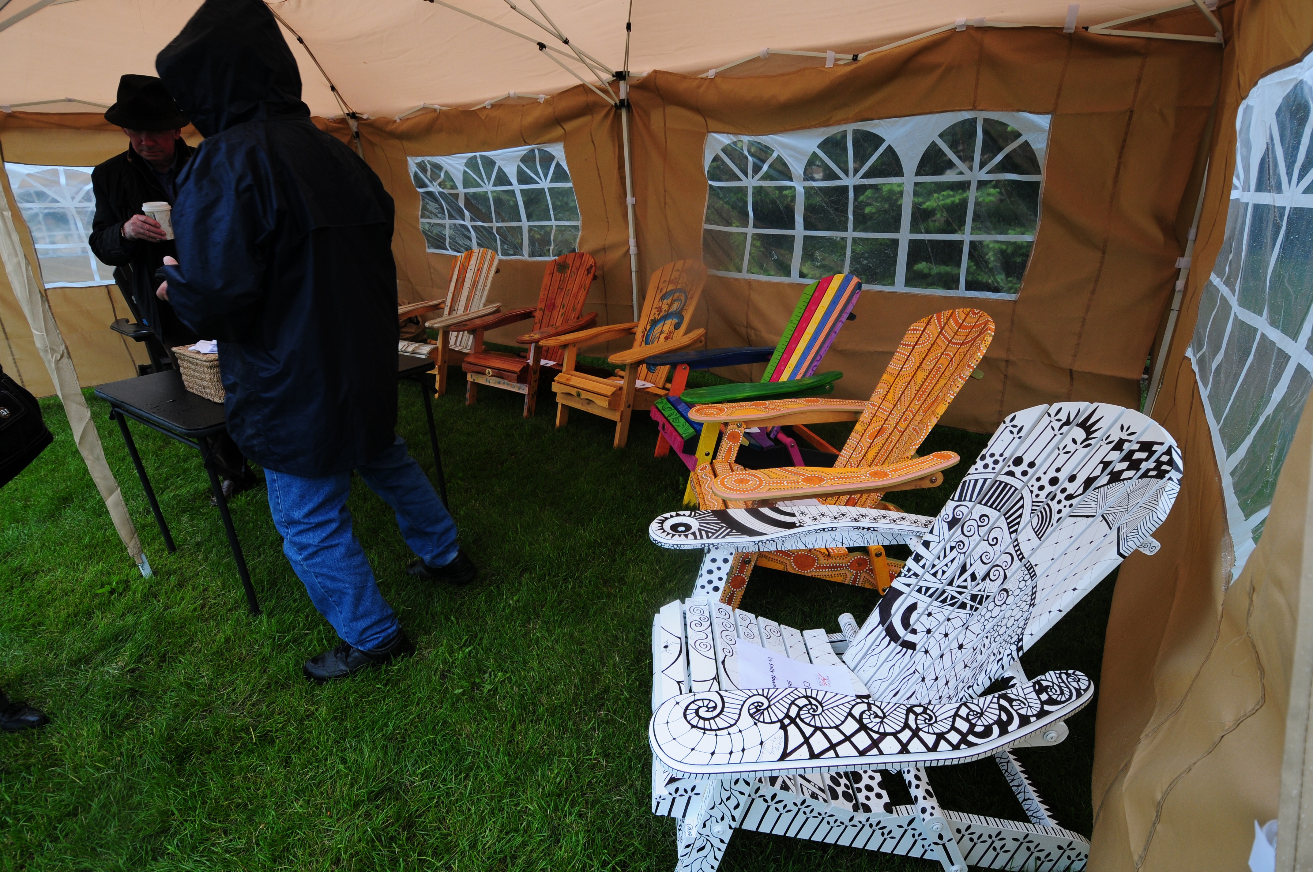 UNIQUE- Eight Muskoka chairs were painted up by local artists and were auctioned off for a fundraiser during Art Walk Saturday at Rotary Recreation Park to promote the arts in Red Deer.