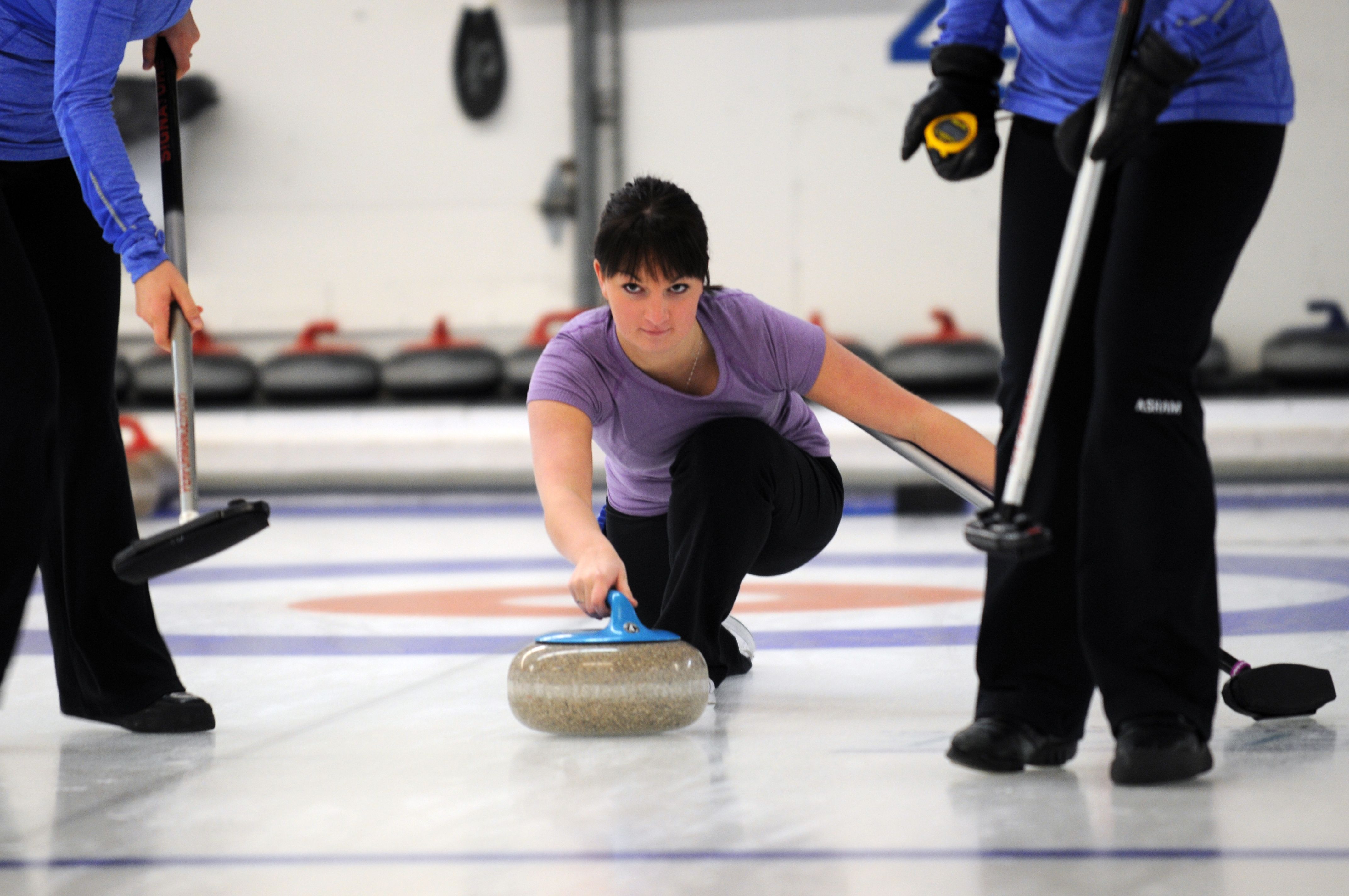 STEADY- Sarah More throws a rock during a curling tournament at the Red Deer Curling Centre this past weekend.