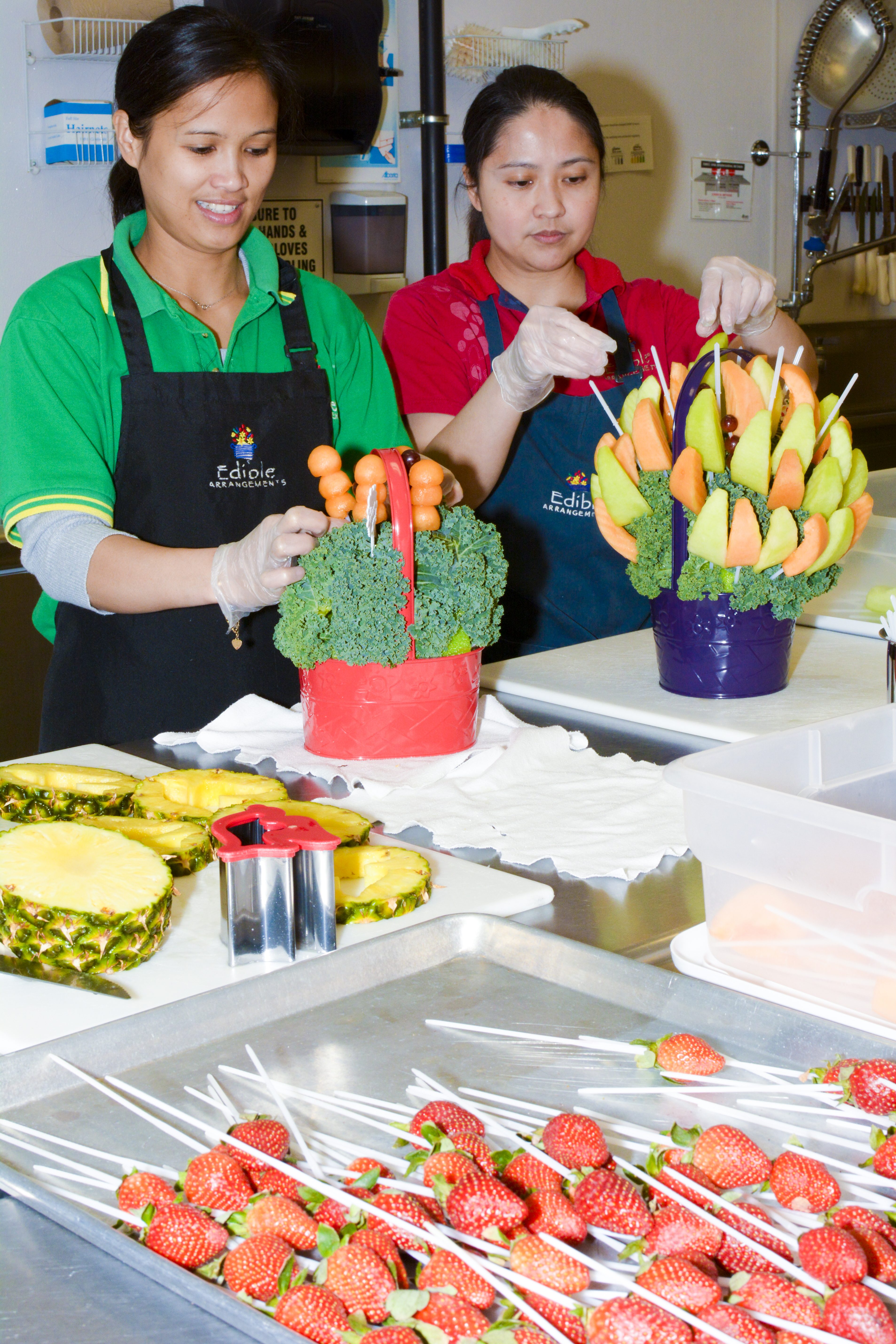 BEHIND THE SCENES – Lucita Alipor and Judith Mitra give a behind the scenes peak at how an Edible Arrangement treat is made.