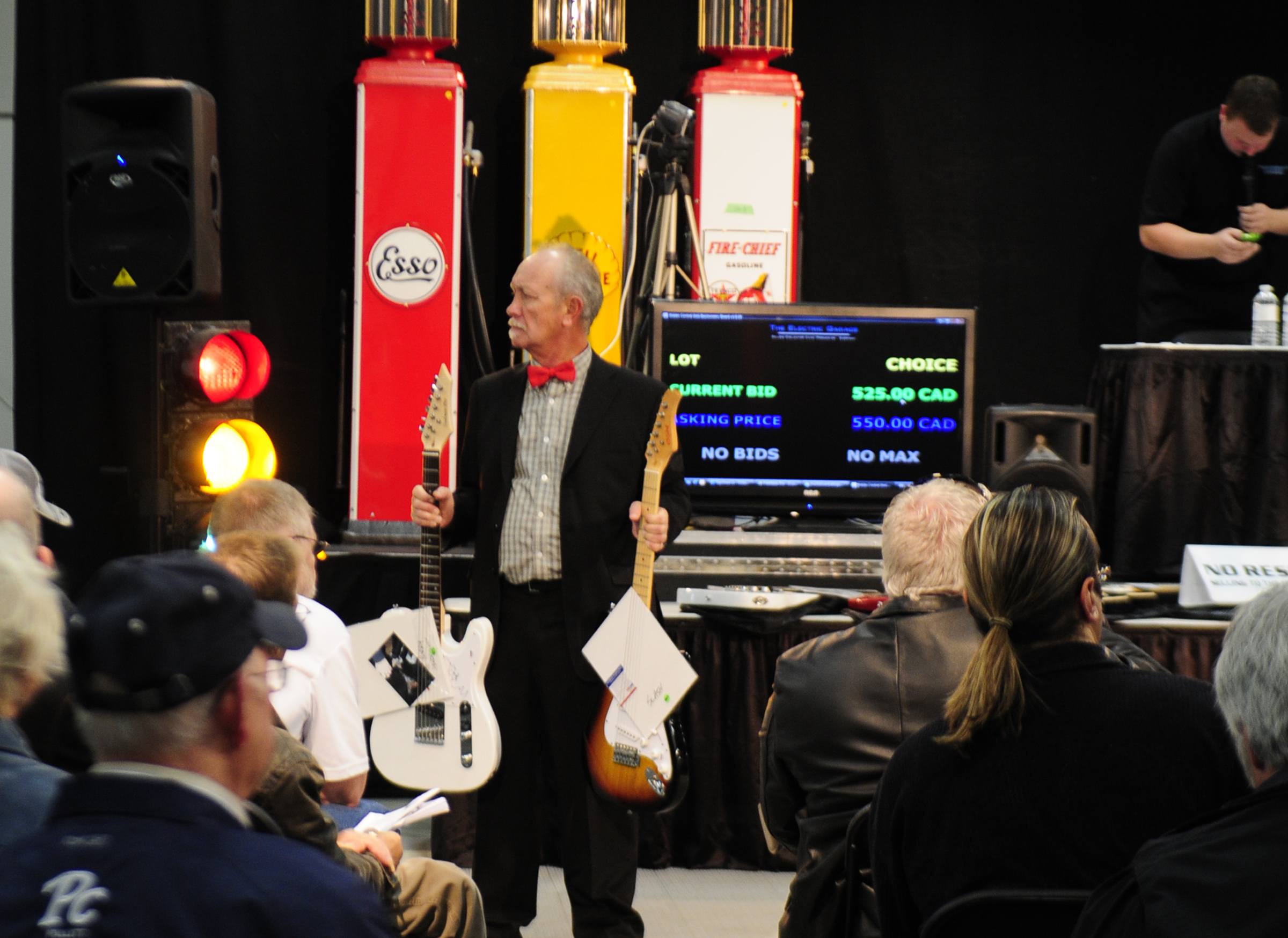 Classic vehicles were not the only exciting thing up for bid during Electric Garage's 3rd Annual Fall Finale Classic Car Auction held at the Westerner Saturday. Guitars signed by band members of AC/DC