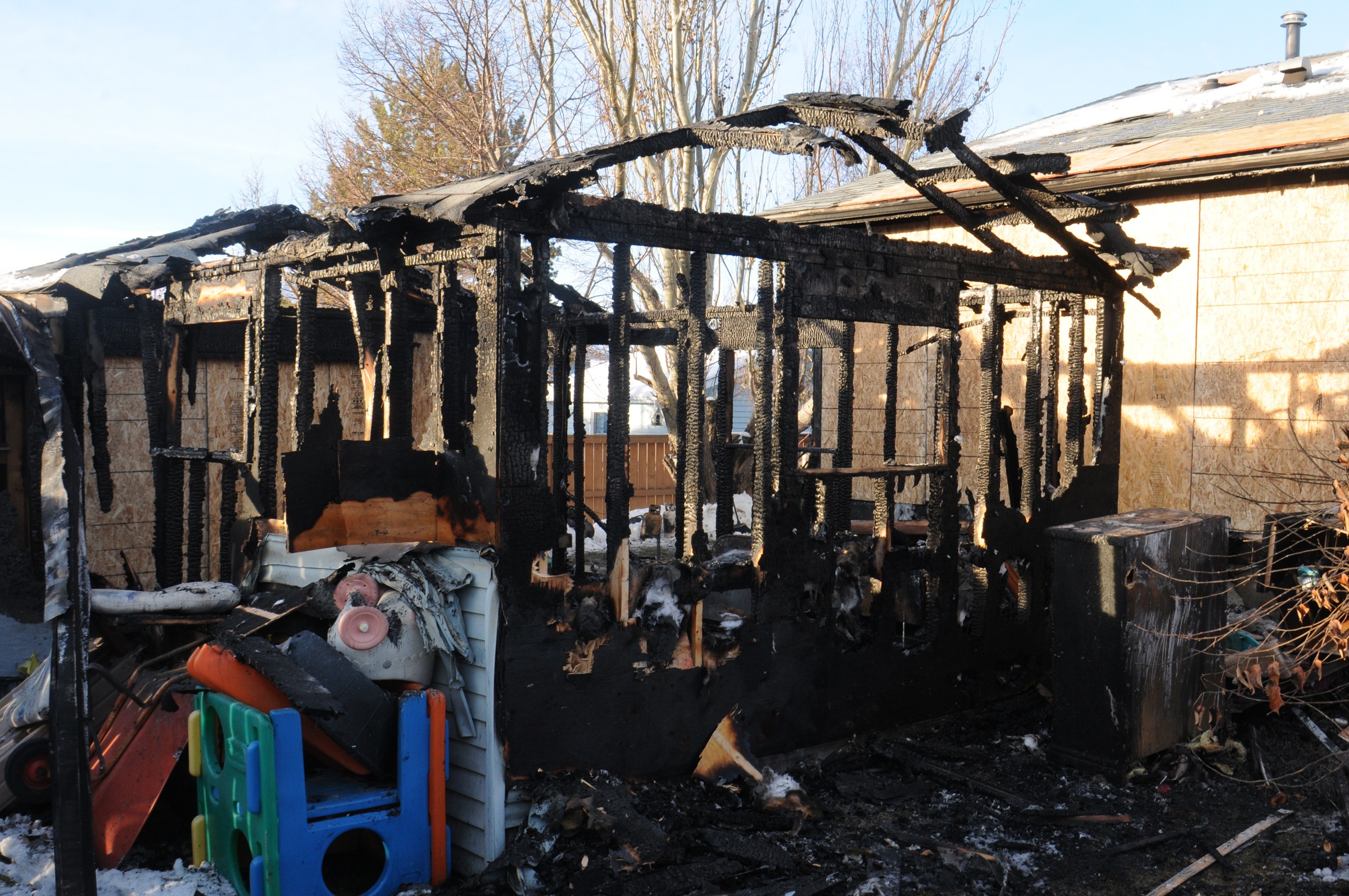 GARAGE FIRE- A detached garage fire in the Eastview area of Red Deer  Wednesday had Red Deer Emergency Services crews battling to keep it from spreading. The fire spread to the roof of the house but was quickly controlled.