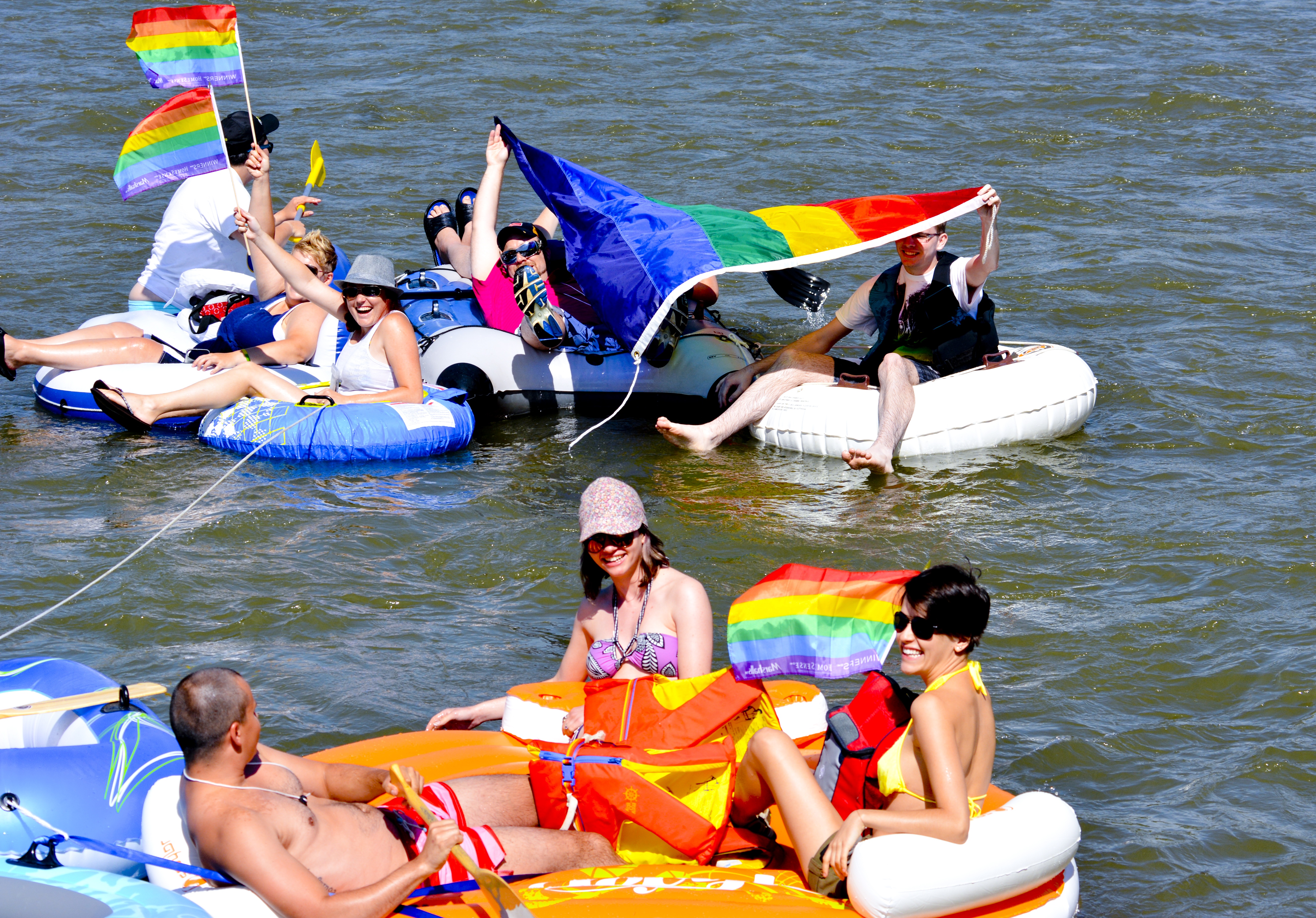 FLOATING PRIDE - Members of Alberta’s pride community soak up the warm weather while enjoying a float down the Red Deer River this past weekend as part of the Central Alberta Pride Days.
