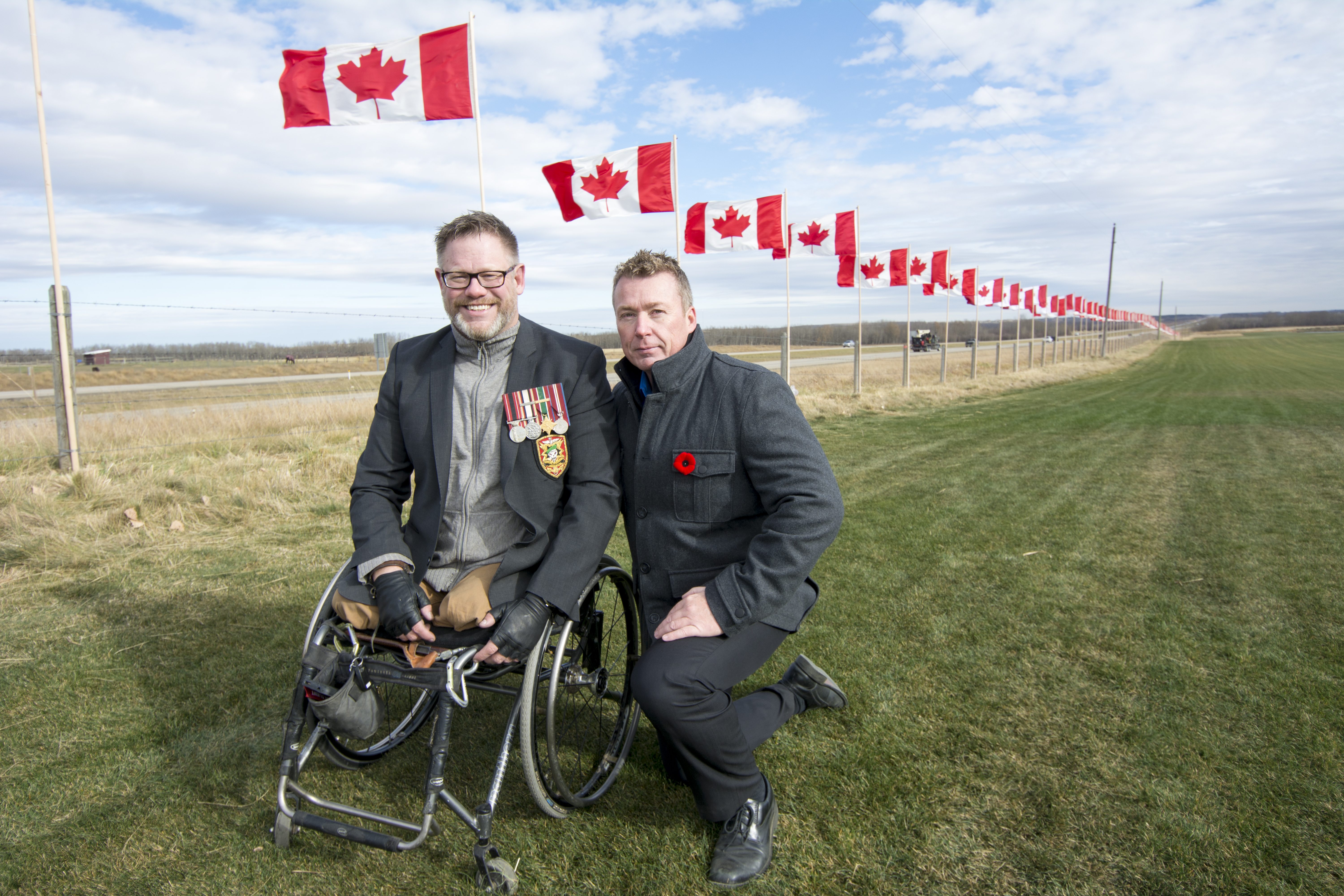 PATRIOTIC MOMENT – Retired Master Corporal Paul Franklin takes a moment to appreciate the work of Allan Cameron