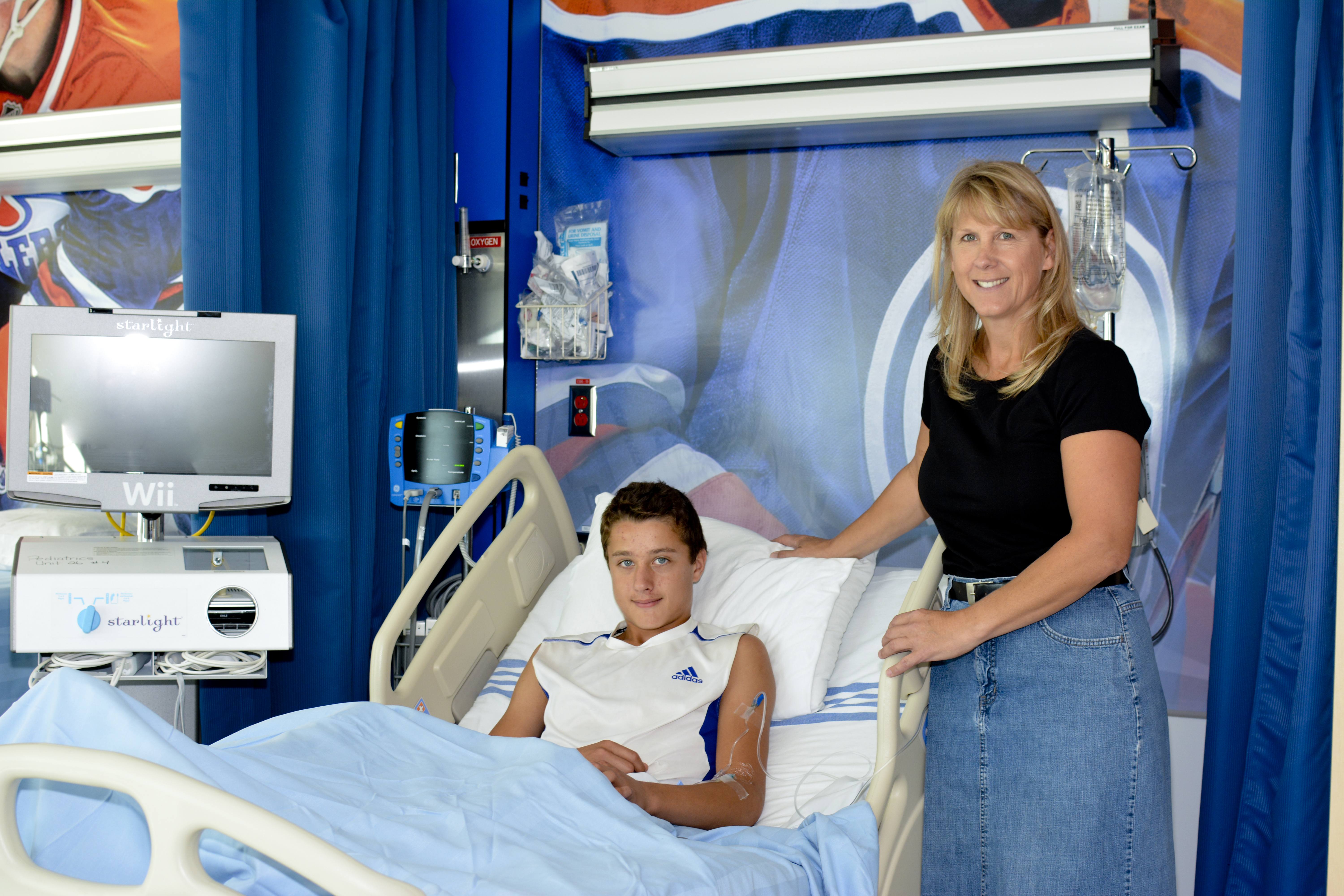 NEW ROOM – The Edmonton Oilers Community Foundation recently funded a renovated patient room on the pediatrics unit at the Red Deer Hospital. Among the first to stay in the room is Kaiden Eadie