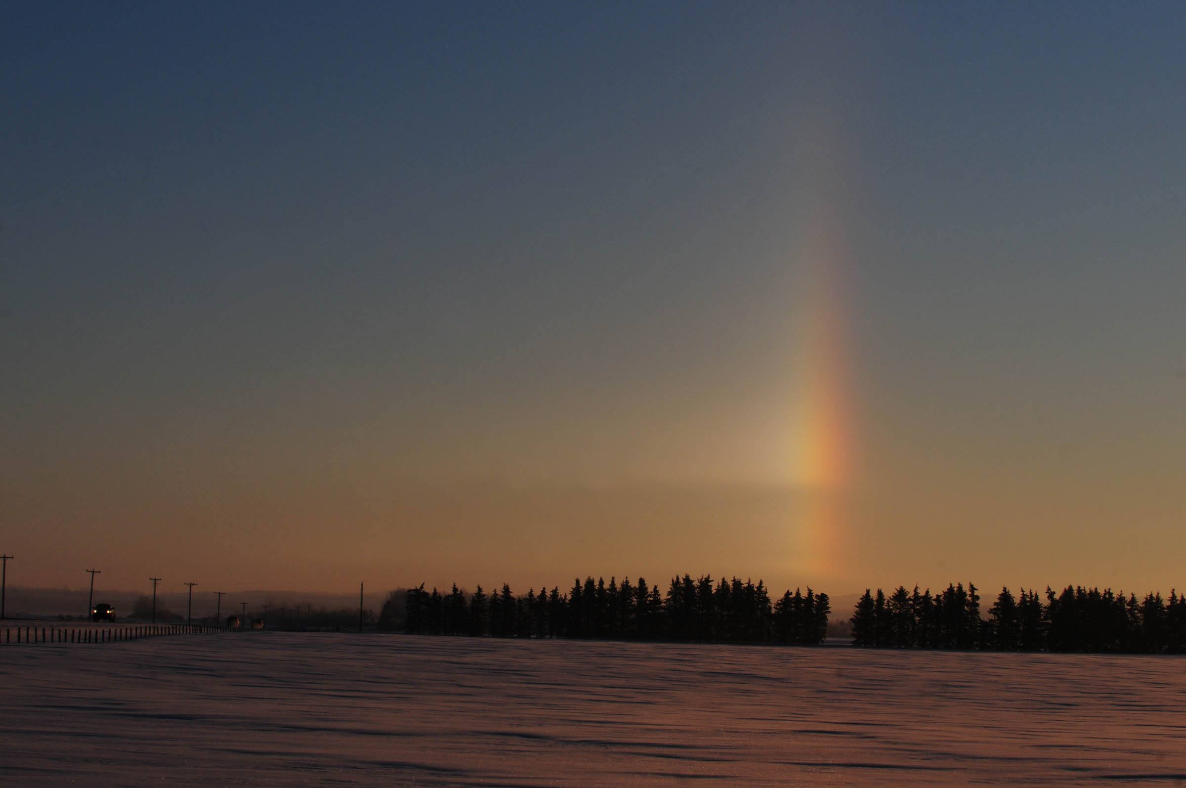 MORNING COLOURS- A beautiful rainbow shoots straight up into the sky just east of the City Tuesday morning as Red Deerians made their way to work.