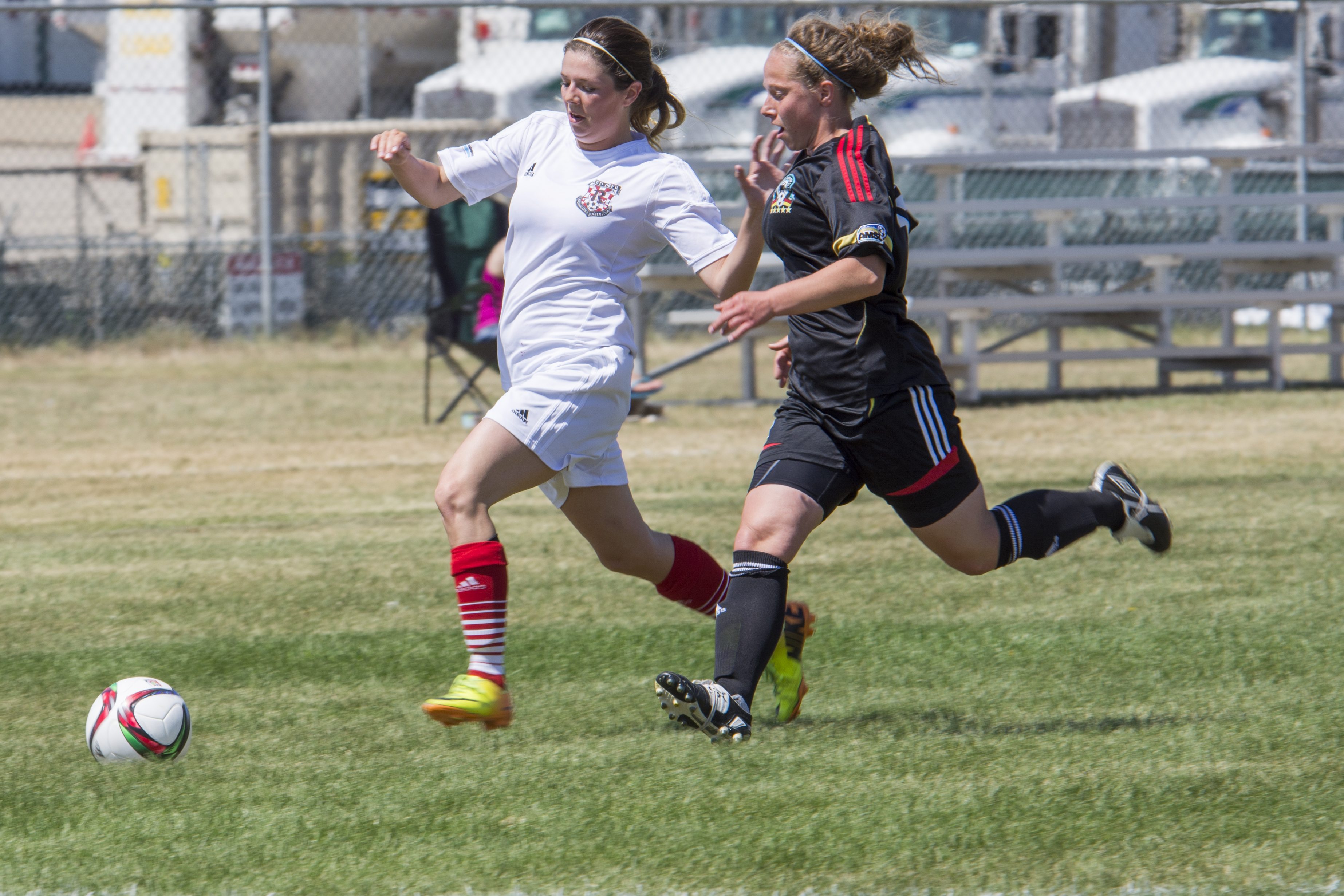TOUGH LOSS – Red Deer Renegades Kayla Blacquiere pushes the ball up the field in a match on Sunday in Red Deer against the Victoria Soccer Club out of Edmonton.