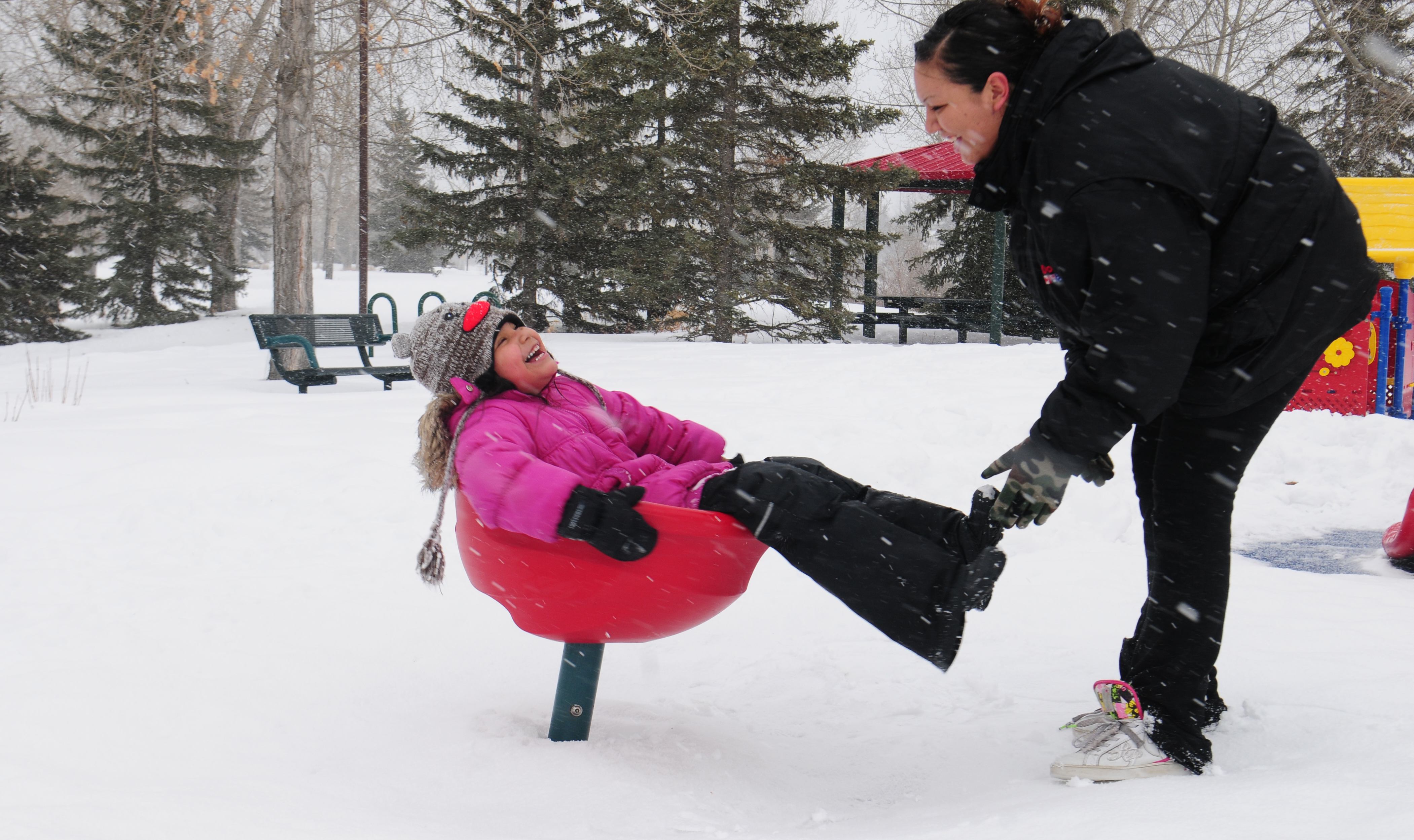 WINTER FUN- Marlina House enjoys a day playing with her daughter Taneal